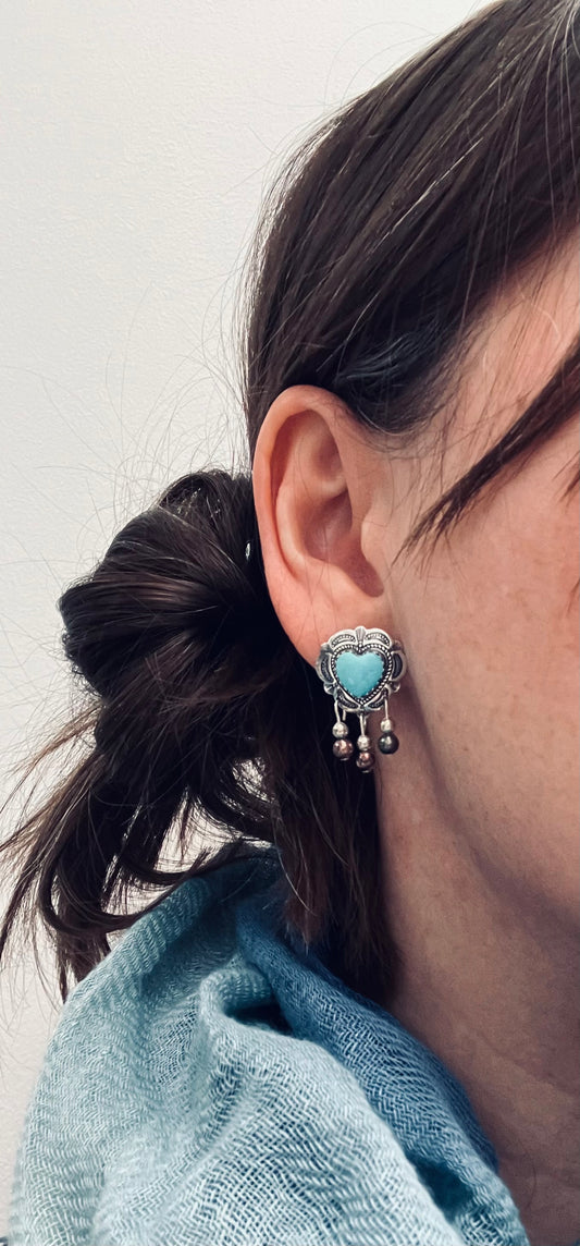 Beautiful vintage sterling silver and turquoise Native American earrings.