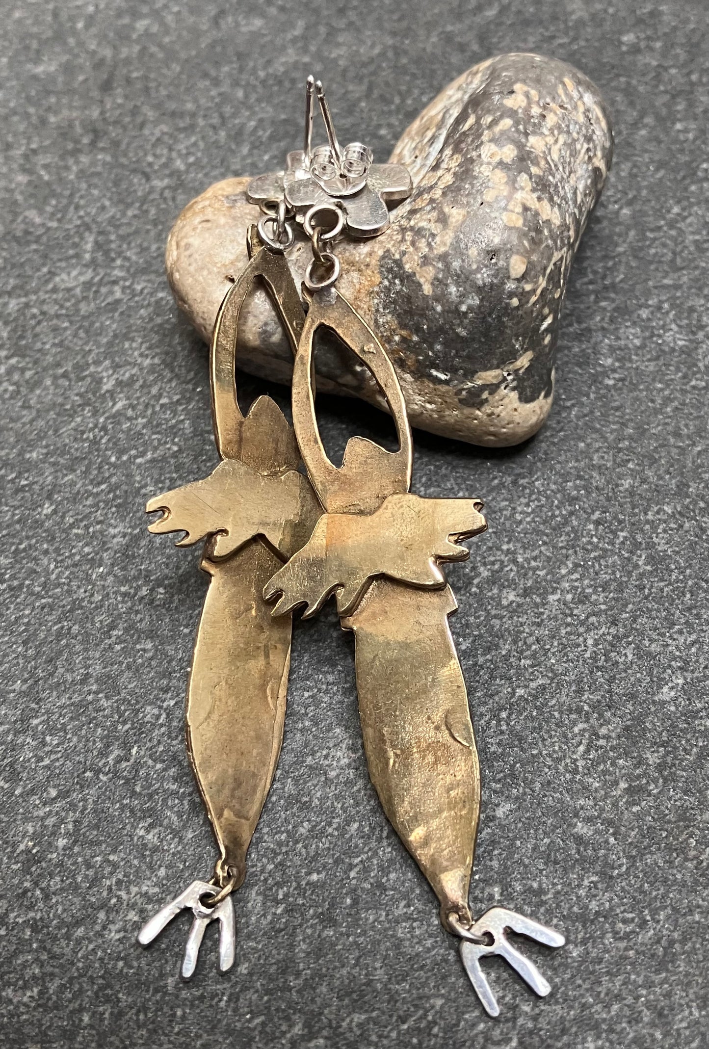 Vintage sterling silver and brass artisan earrings.