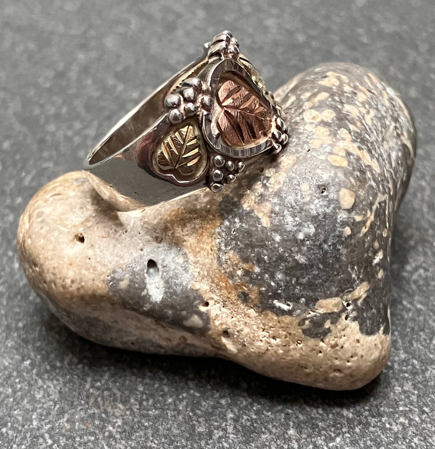 Wonderful vintage sterling silver and 12k gold and rose gold leaf ring. Made by Coleman &Co Black Hills.