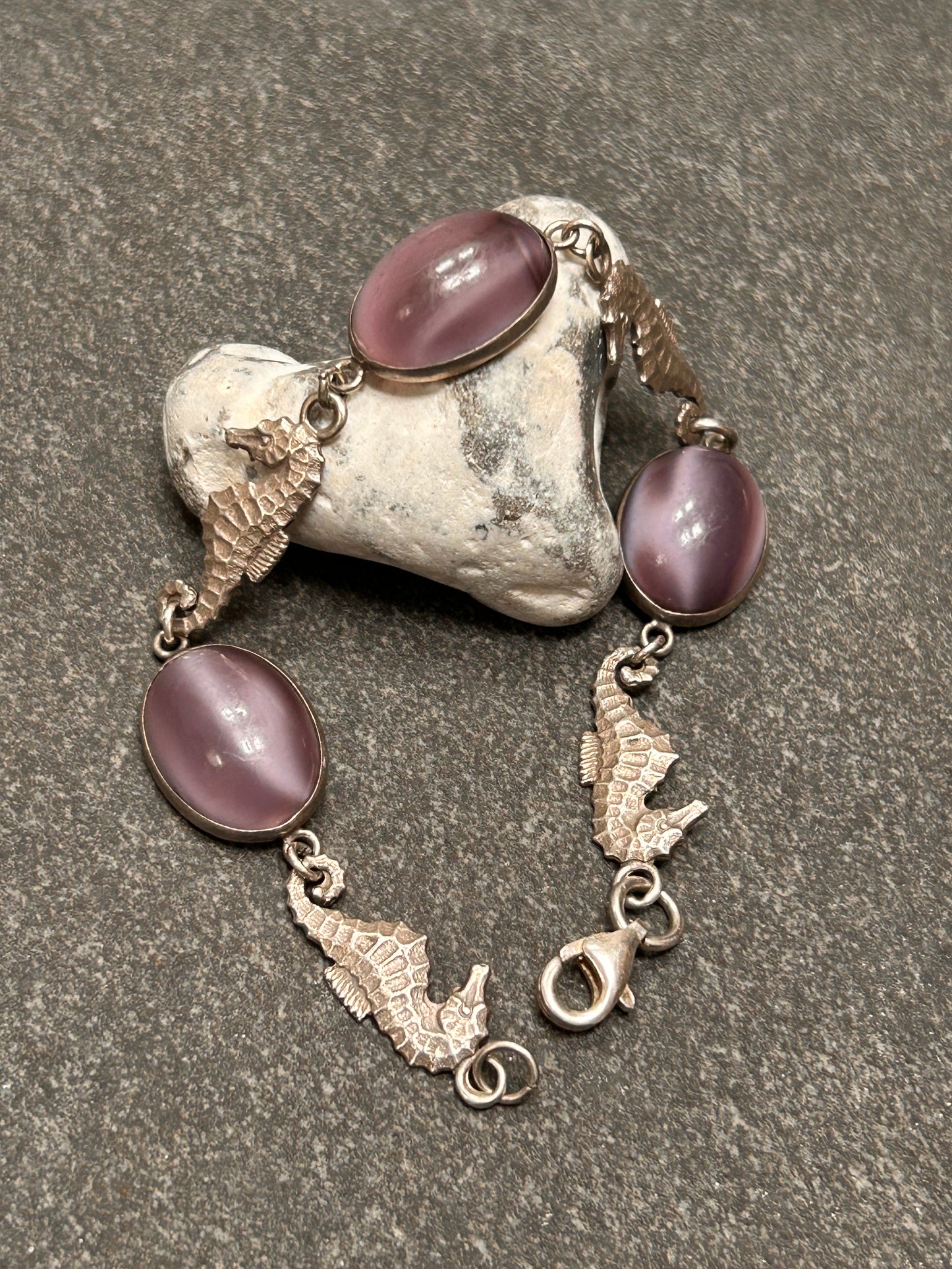 A truly enchanting vintage sterling silver bracelet, featuring four exquisitely detailed seahorses