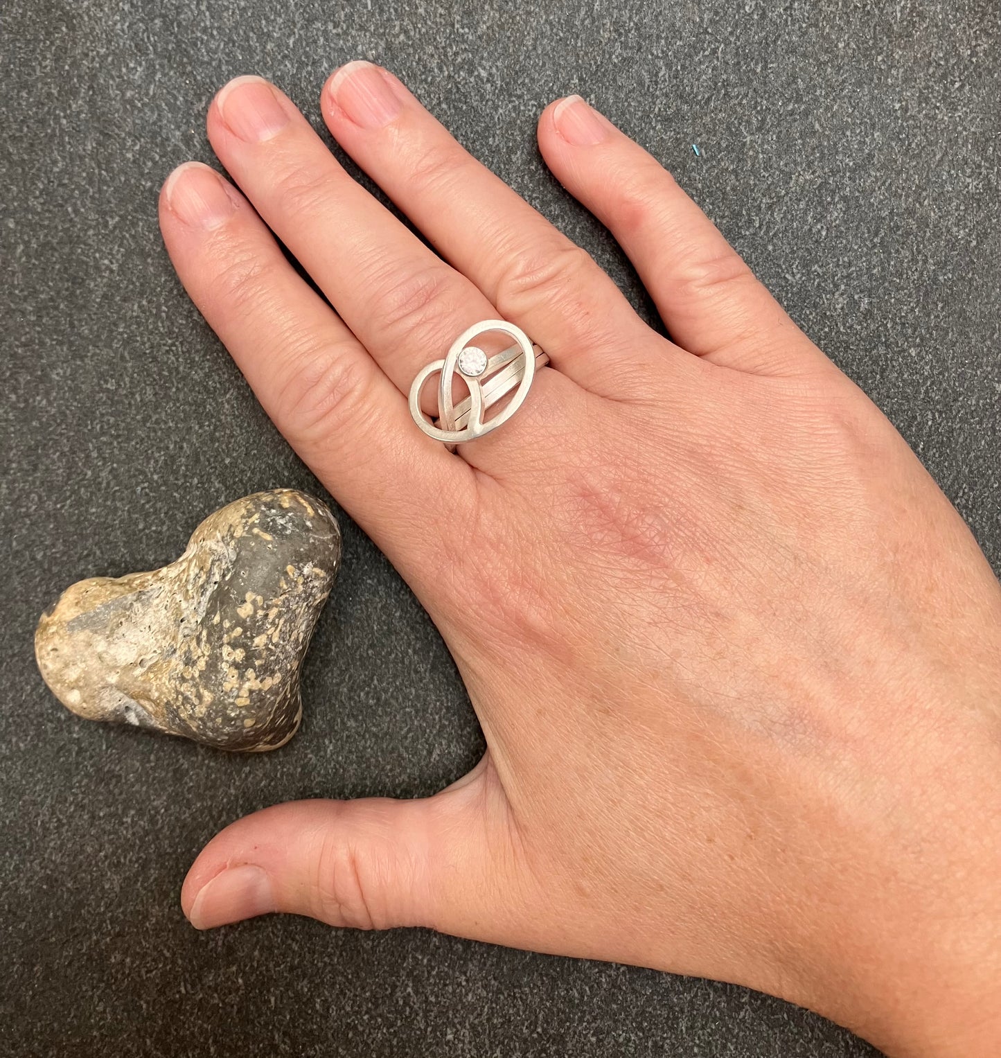 Absolutely stunning vintage sterling silver ring with a cut quartz crystal stone.