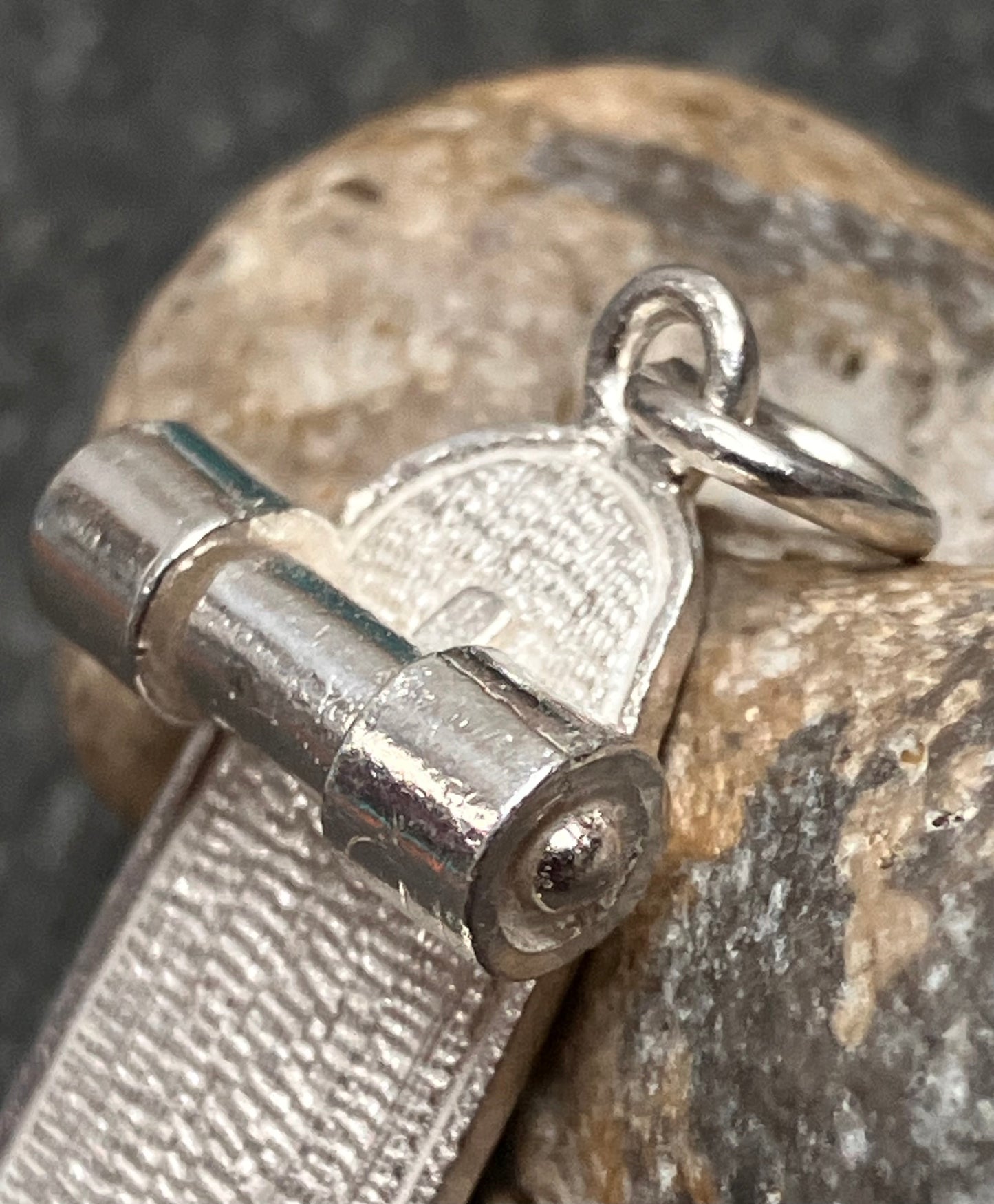 Vintage sterling silver skateboard pendant.