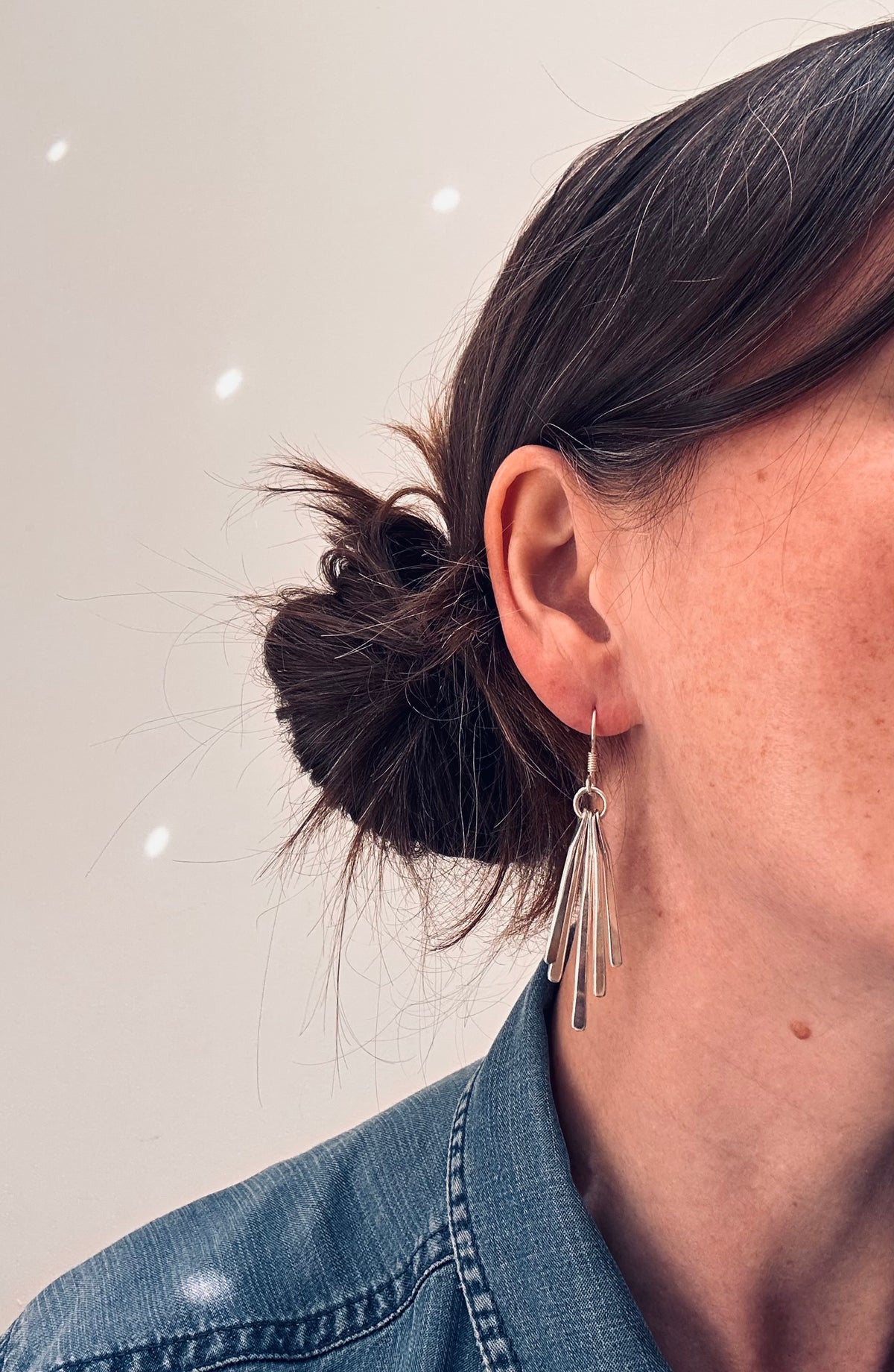 Mexican sterling silver earrings featuring slender bars.