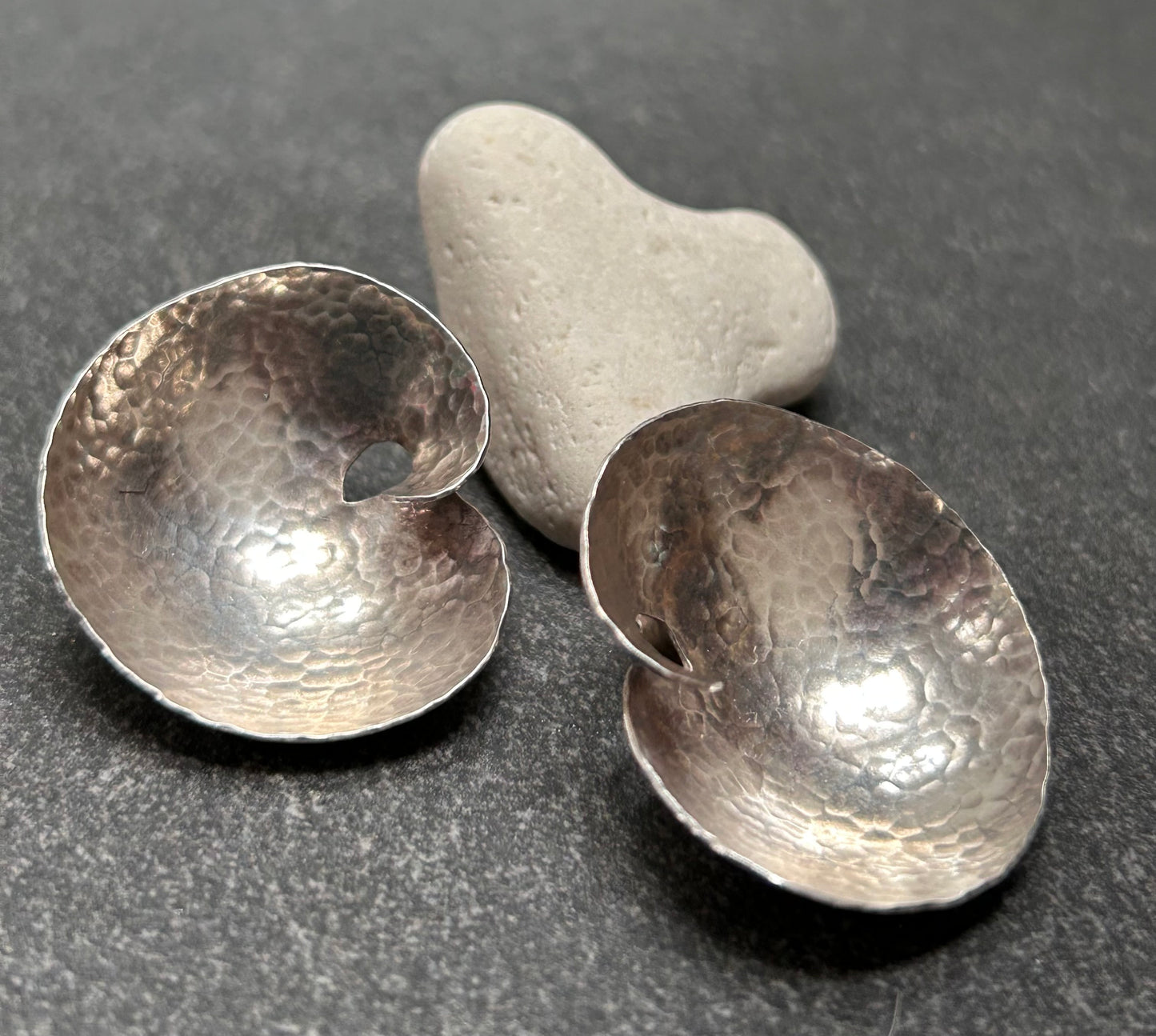 A striking pair of artisan-made vintage sterling silver earrings