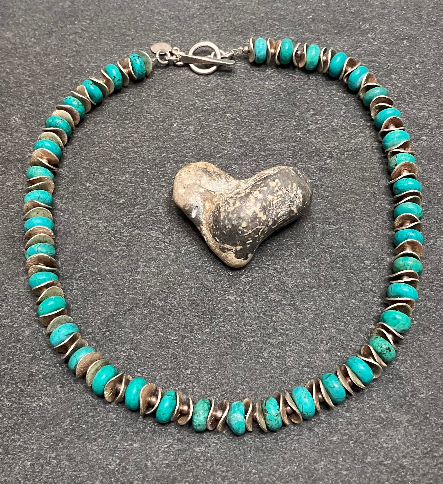 Absolutely stunning artisan made sterling silver and turquoise bead necklace.