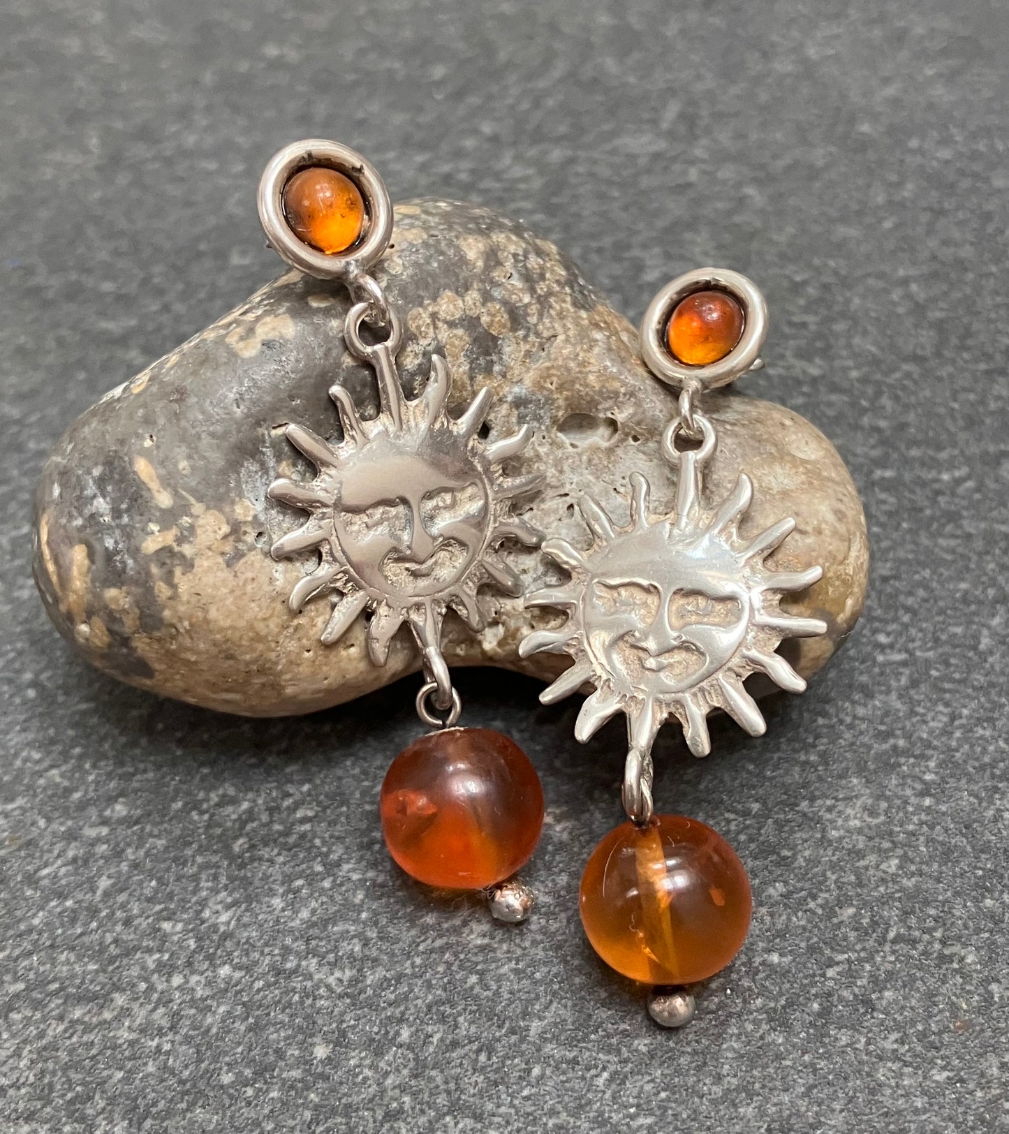 Absolutely fantastic vintage sterling silver sun and amber earrings.