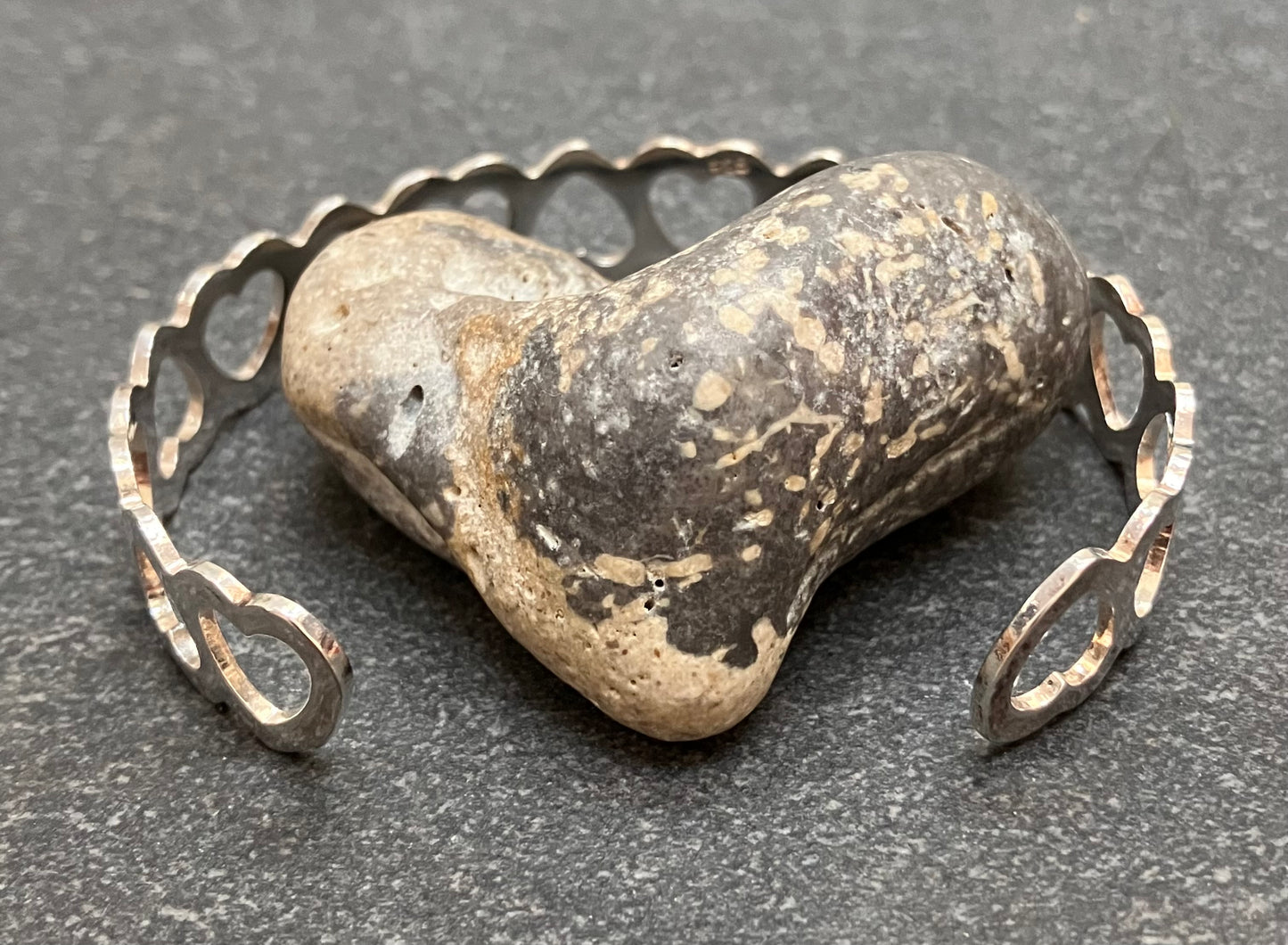 Vintage sterling silver heart bangle.