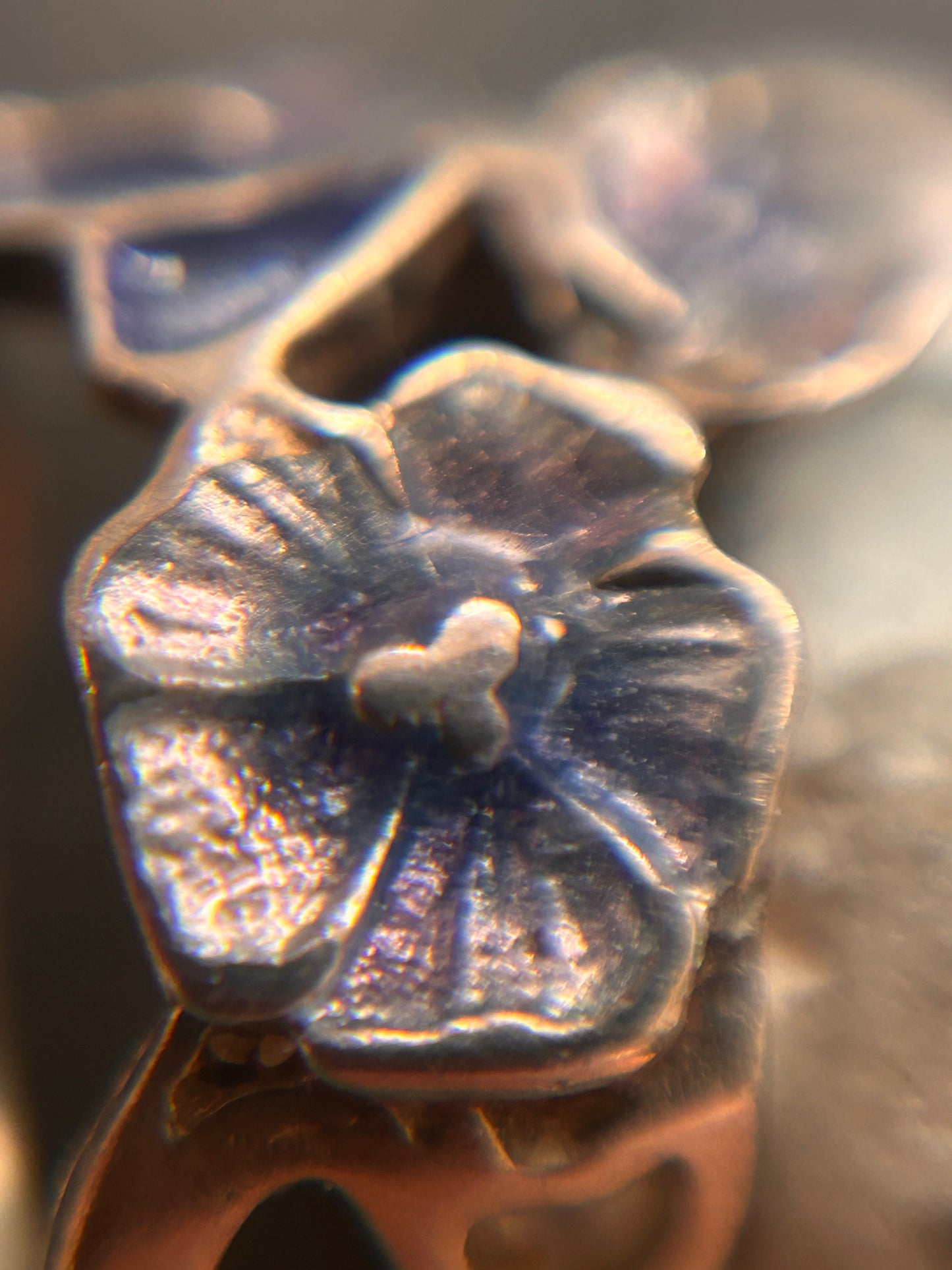 A beautiful and delicate vintage sterling silver ring by renowned silversmith and enamel artist Pat Cheney.