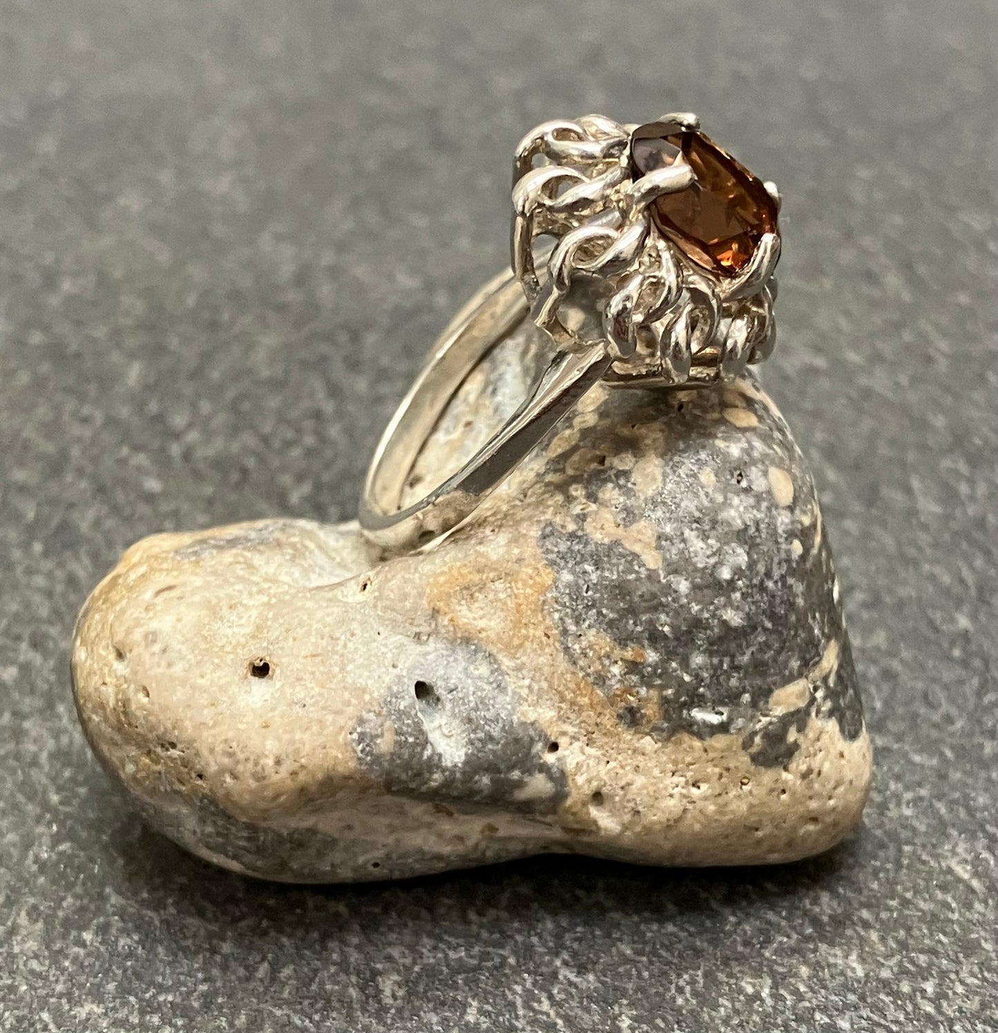 Vintage sterling silver ring set with a mandarin garnet cut stone