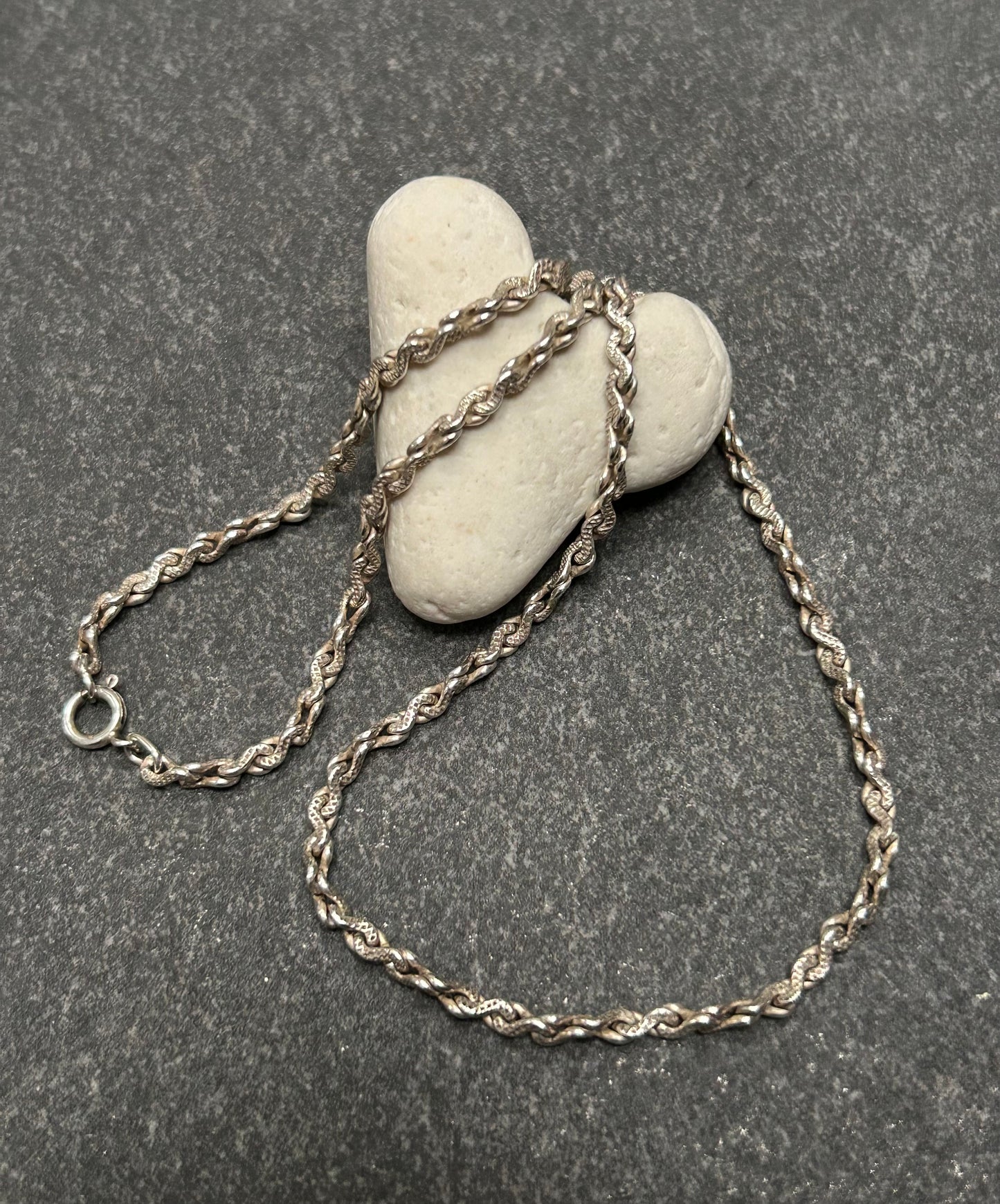 Beautiful vintage sterling silver necklace features elegant infinity links