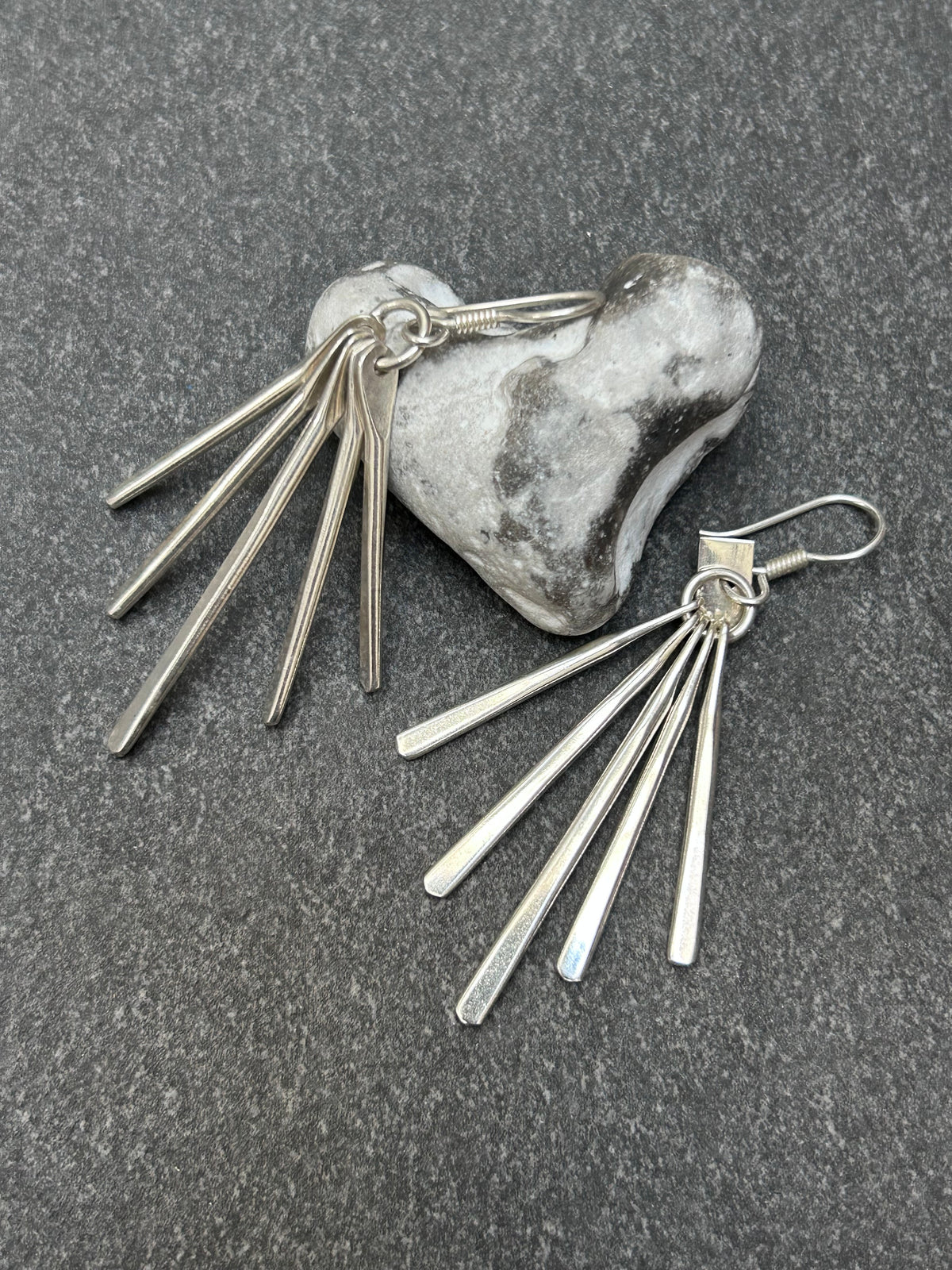 Mexican sterling silver earrings featuring slender bars.
