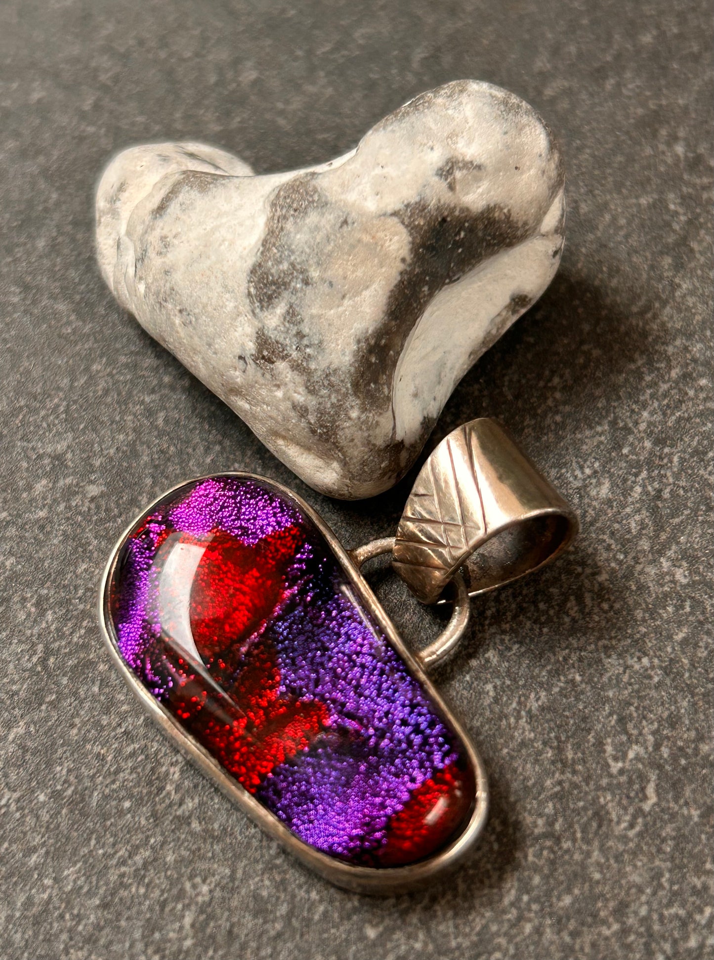 Striking vintage sterling silver dichroic glass pendant