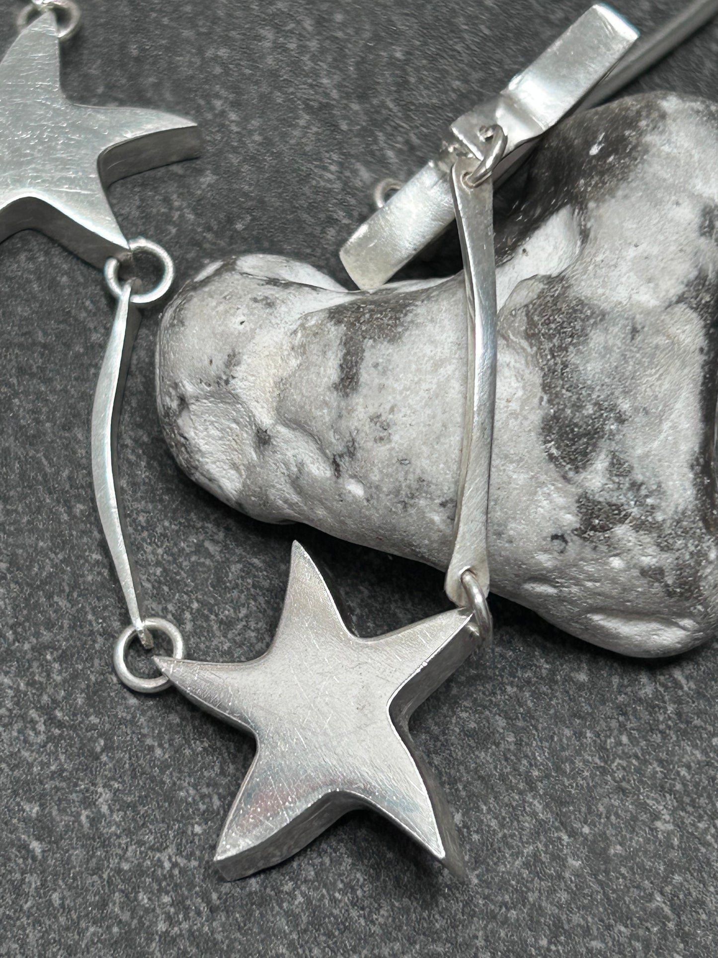 Wonderfully sculptural vintage sterling silver star necklace