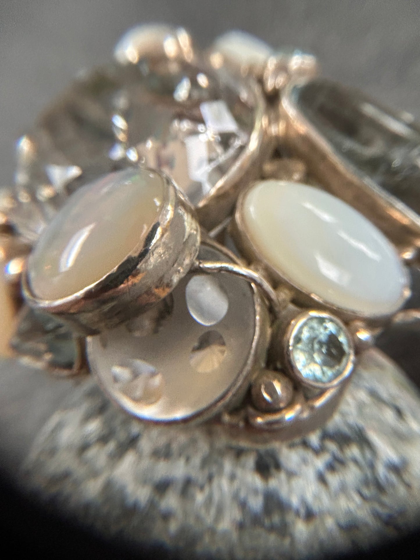 Spectacular Polish Artisan Double-Finger Ring.
Sterling Silver, Rock Crystal, Topaz, Opals, Aquamarine & Pearls.