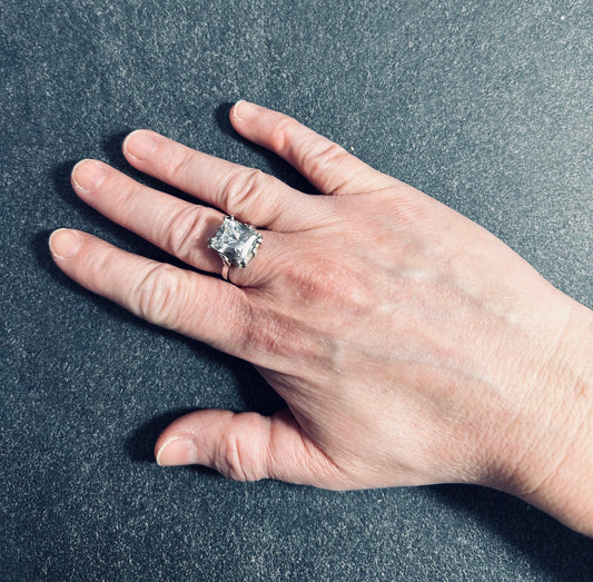 vintage Polish ring is crafted in sterling silver and set with a beautifully cut rectangular quartz crystal