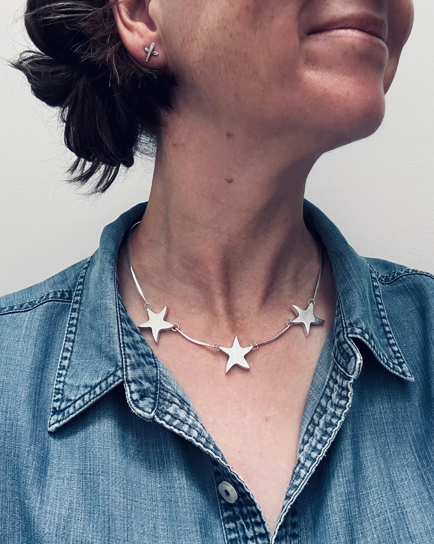 Wonderfully sculptural vintage sterling silver star necklace