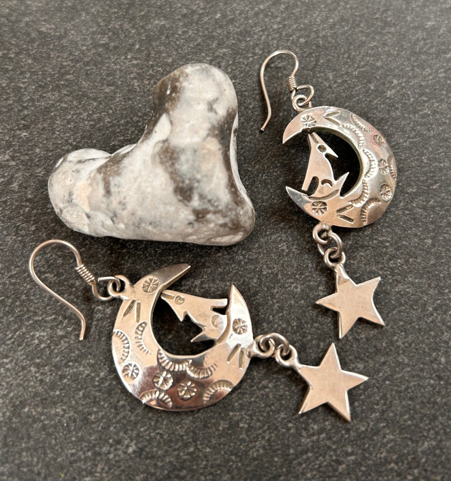 Fantastic vintage sterling silver Mexican earrings featuring a wonderfully whimsical celestial design of a howling wolf nestled within a crescent moon