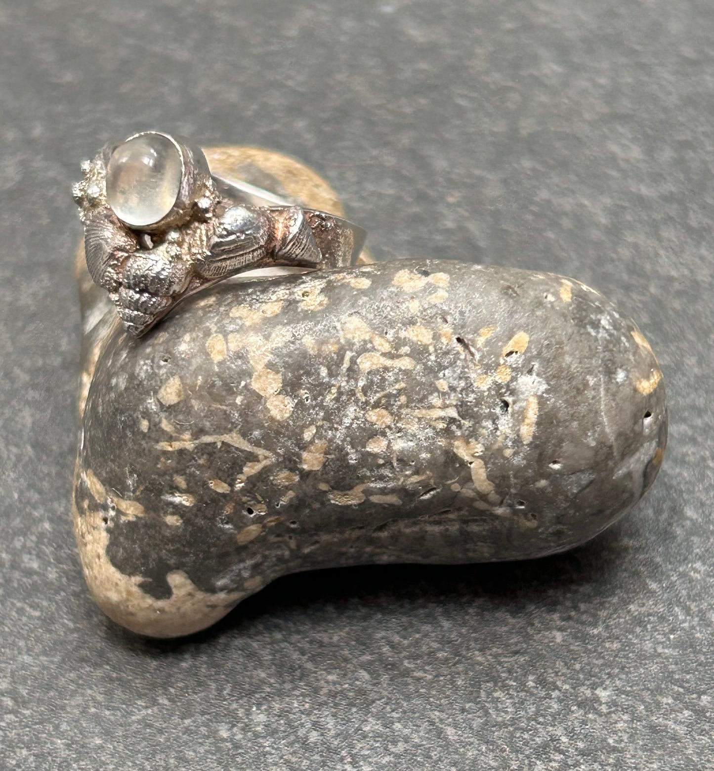 Vintage sterling silver moonstone and shell artisan ring.