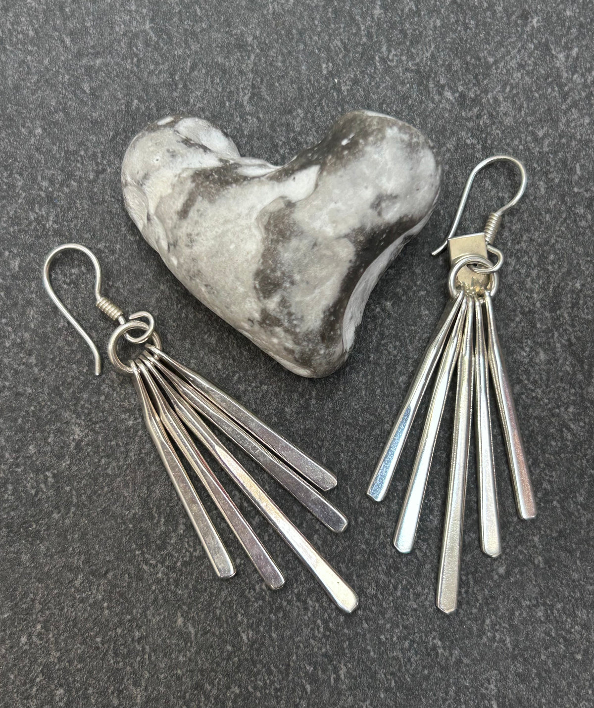 Mexican sterling silver earrings featuring slender bars.