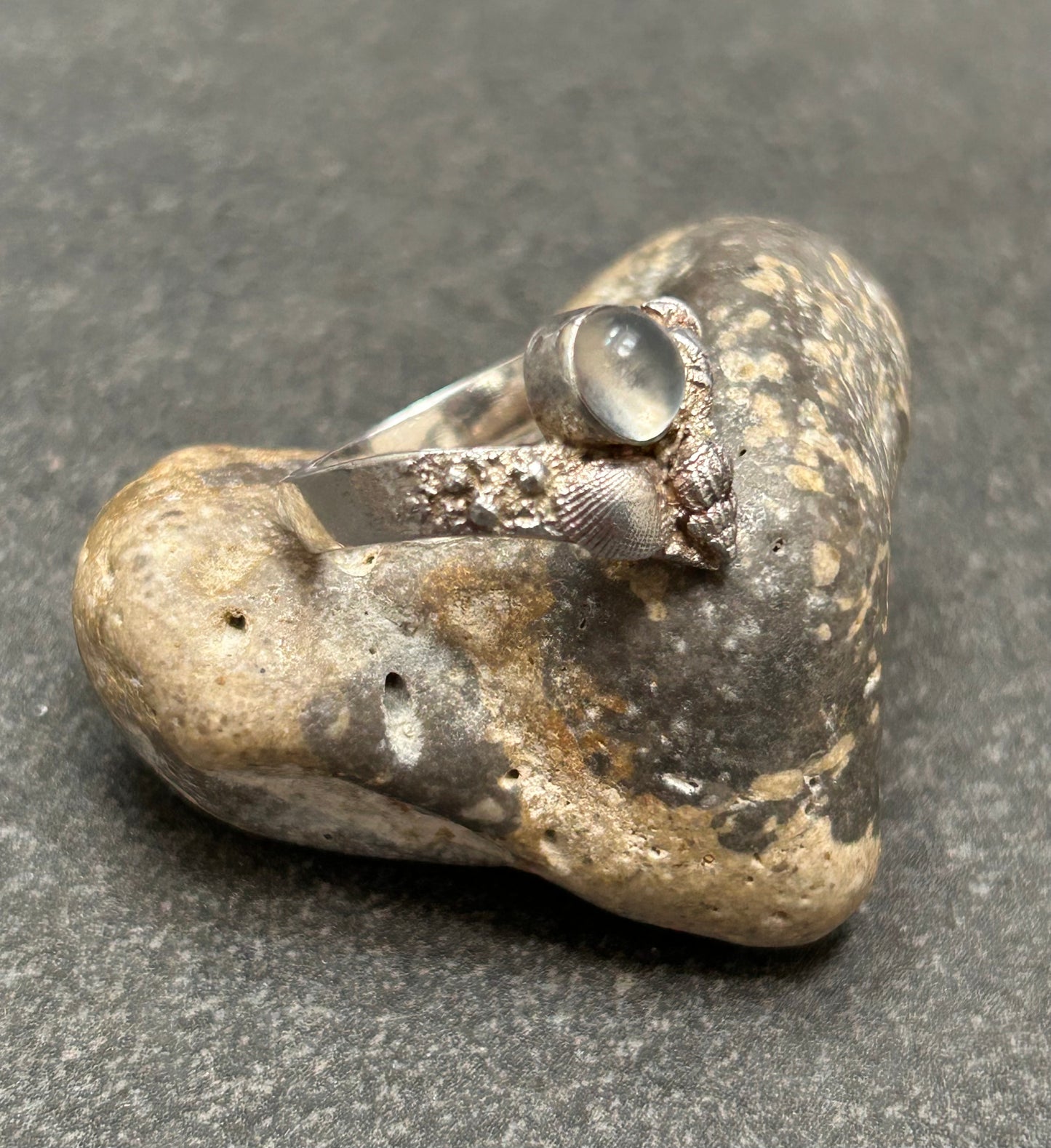 Vintage sterling silver moonstone and shell artisan ring.