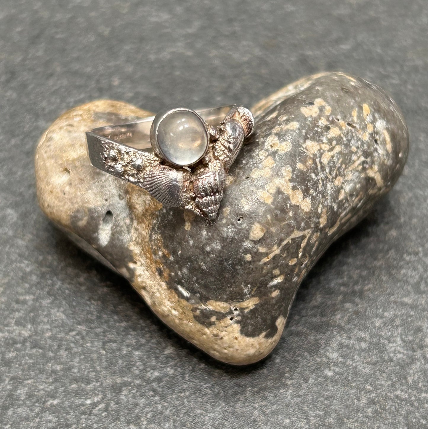 Vintage sterling silver moonstone and shell artisan ring.