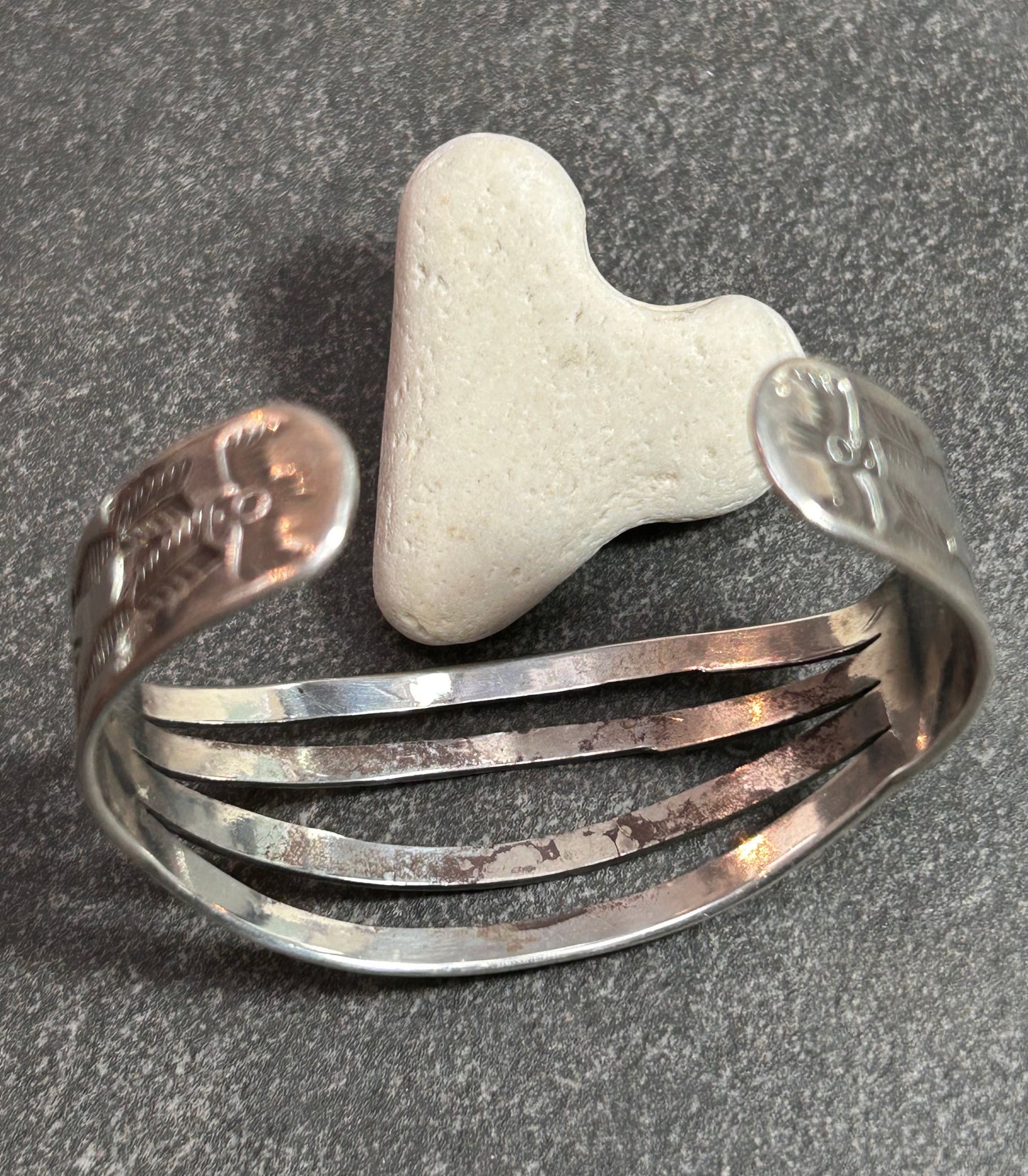 Native American vintage sterling silver bracelet is crafted from a beautifully shaped bar.