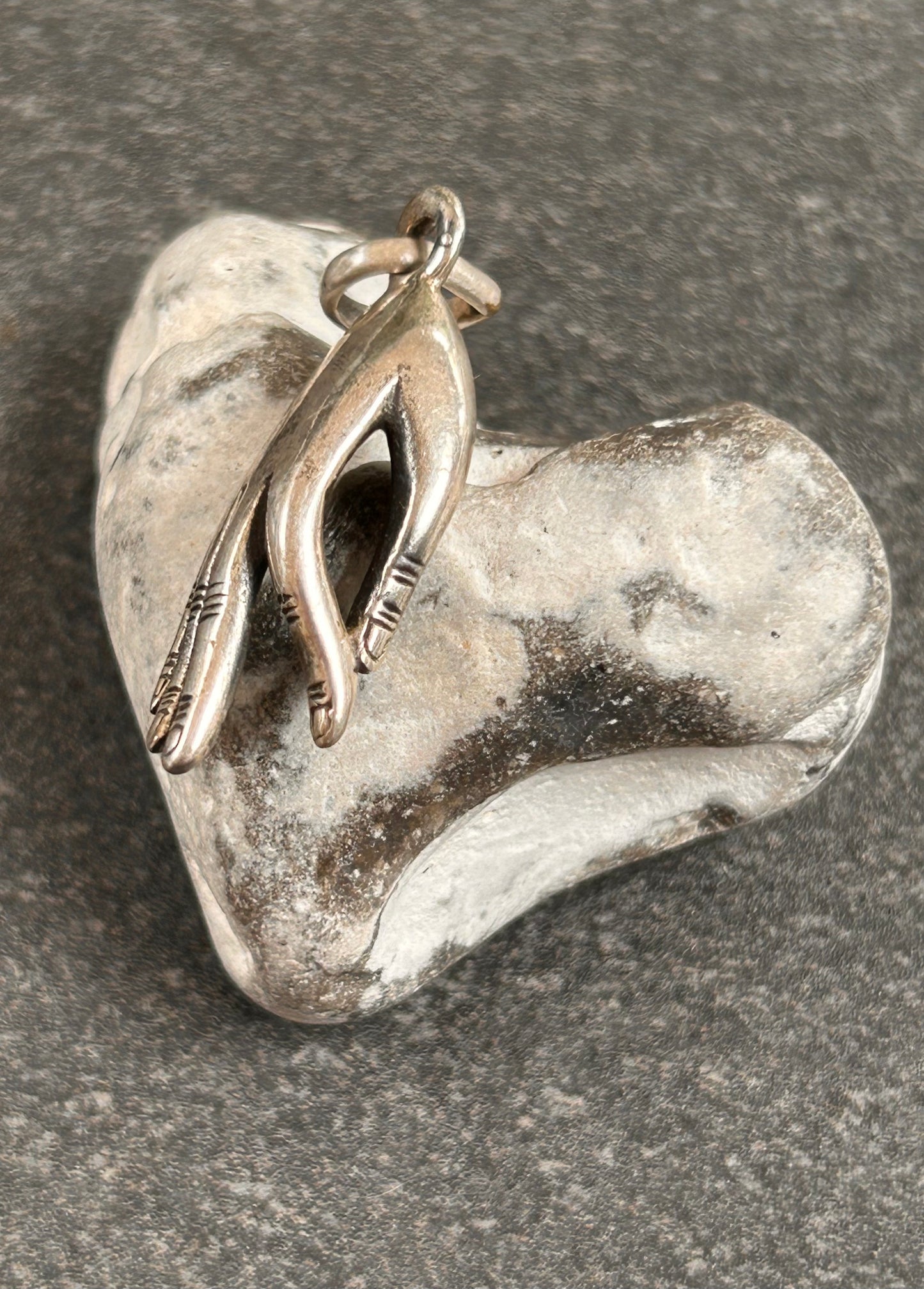 Vintage Hand Pendant
Beautiful vintage hand pendant with index finger and thumb pinched into an elegant pose.