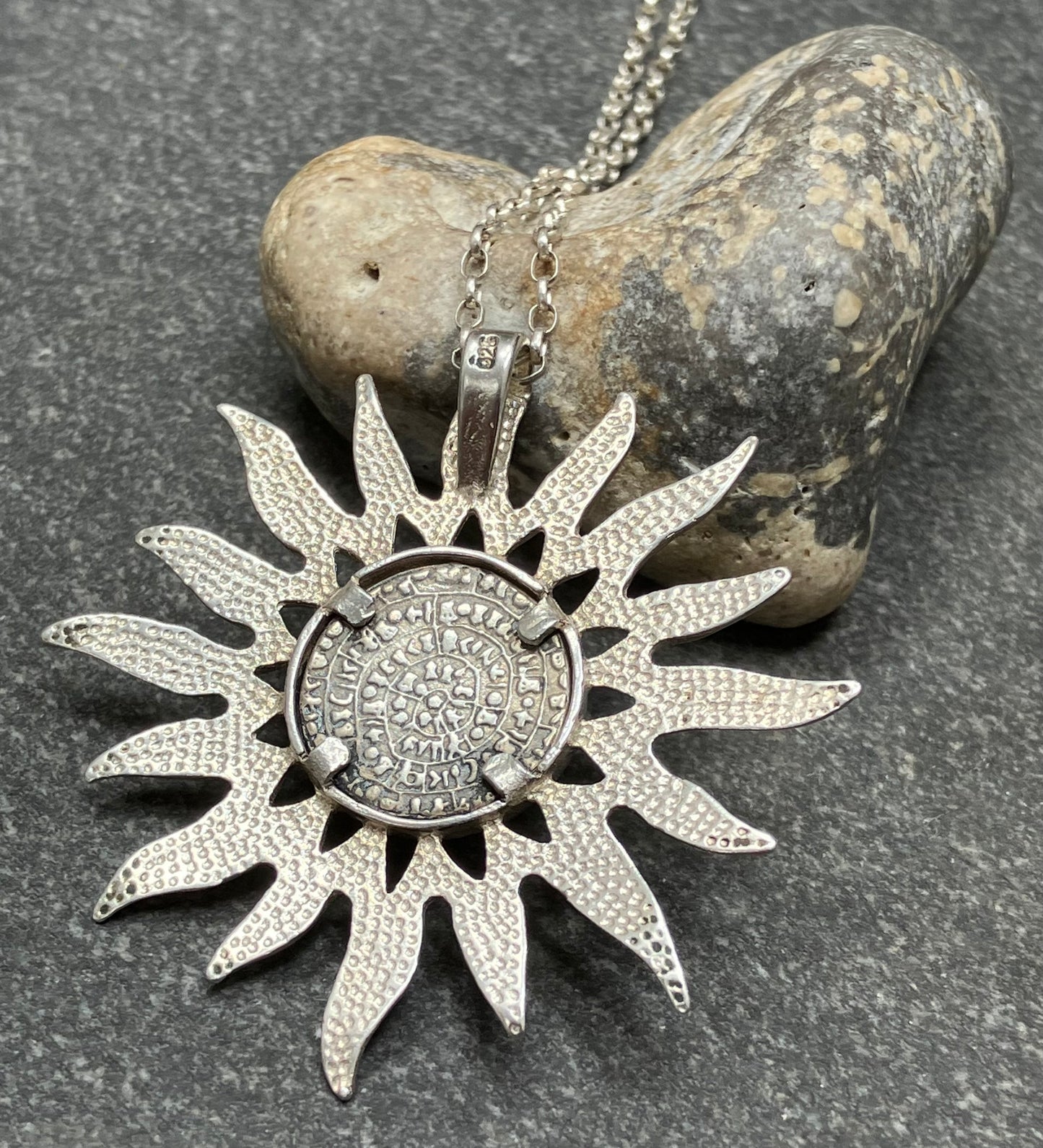 Vintage sterling silver abstract sun or sunflower.