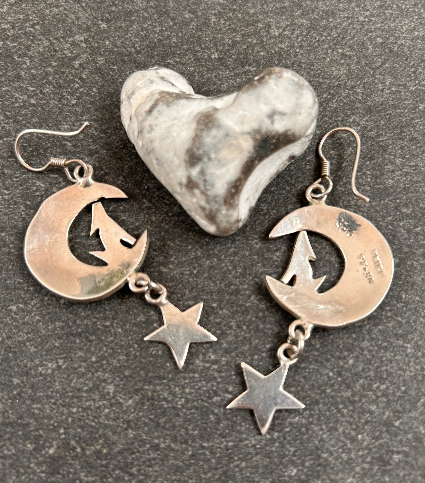 Fantastic vintage sterling silver Mexican earrings featuring a wonderfully whimsical celestial design of a howling wolf nestled within a crescent moon
