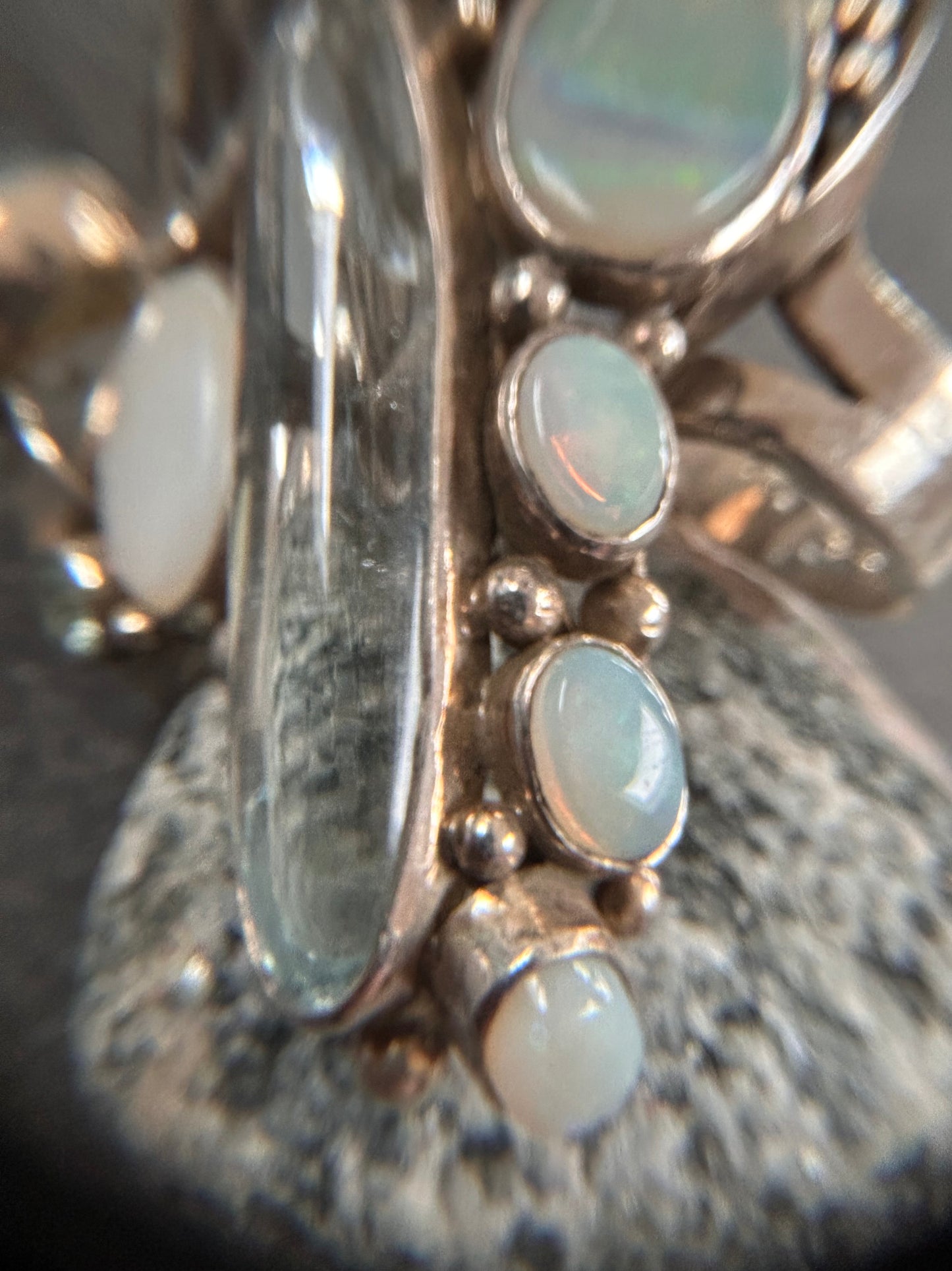 Spectacular Polish Artisan Double-Finger Ring.
Sterling Silver, Rock Crystal, Topaz, Opals, Aquamarine & Pearls.