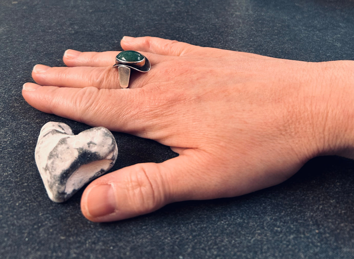 Vintage sterling silver ring set with a beautiful oval cabochon aventurine.