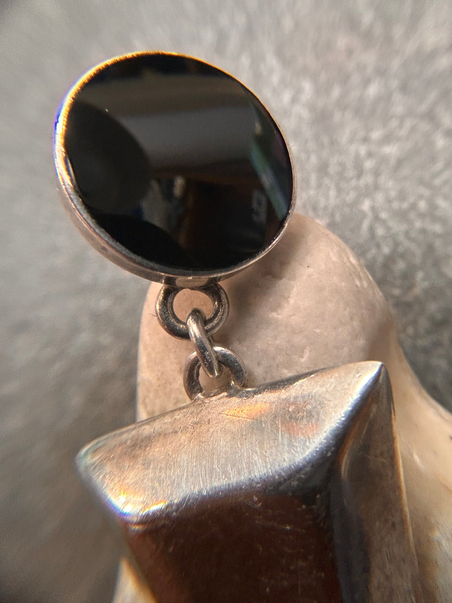 A pair of vintage sterling silver geometric drop earrings with a distinct 1980s aesthetic.
