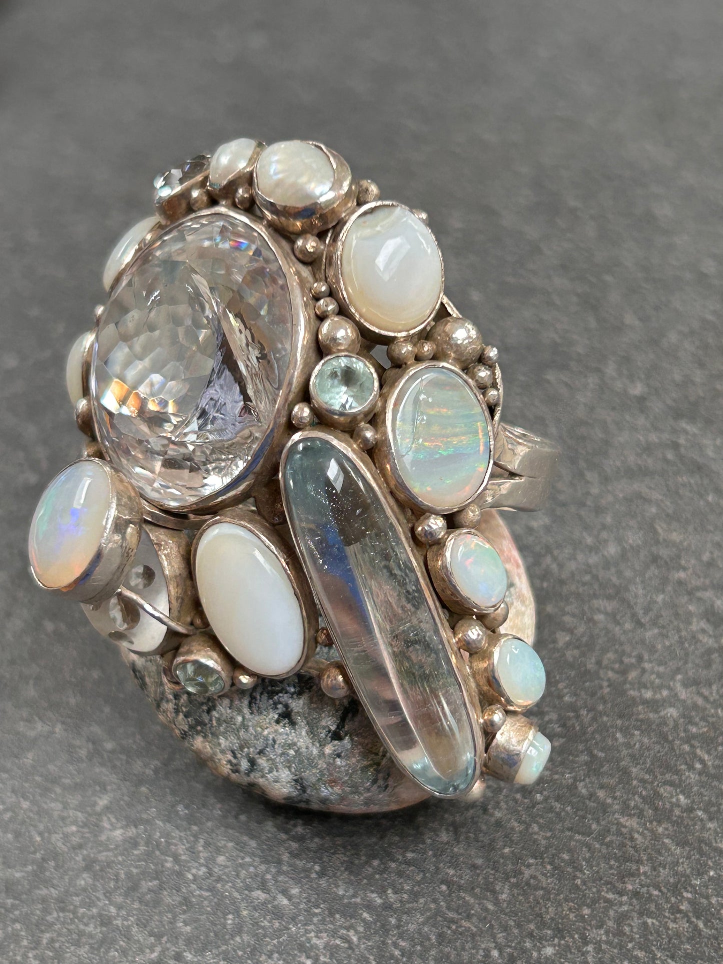 Spectacular Polish Artisan Double-Finger Ring.
Sterling Silver, Rock Crystal, Topaz, Opals, Aquamarine & Pearls.