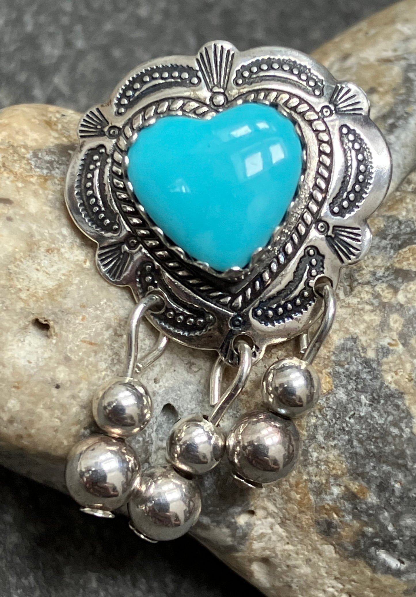 Beautiful vintage sterling silver and turquoise Native American earrings.