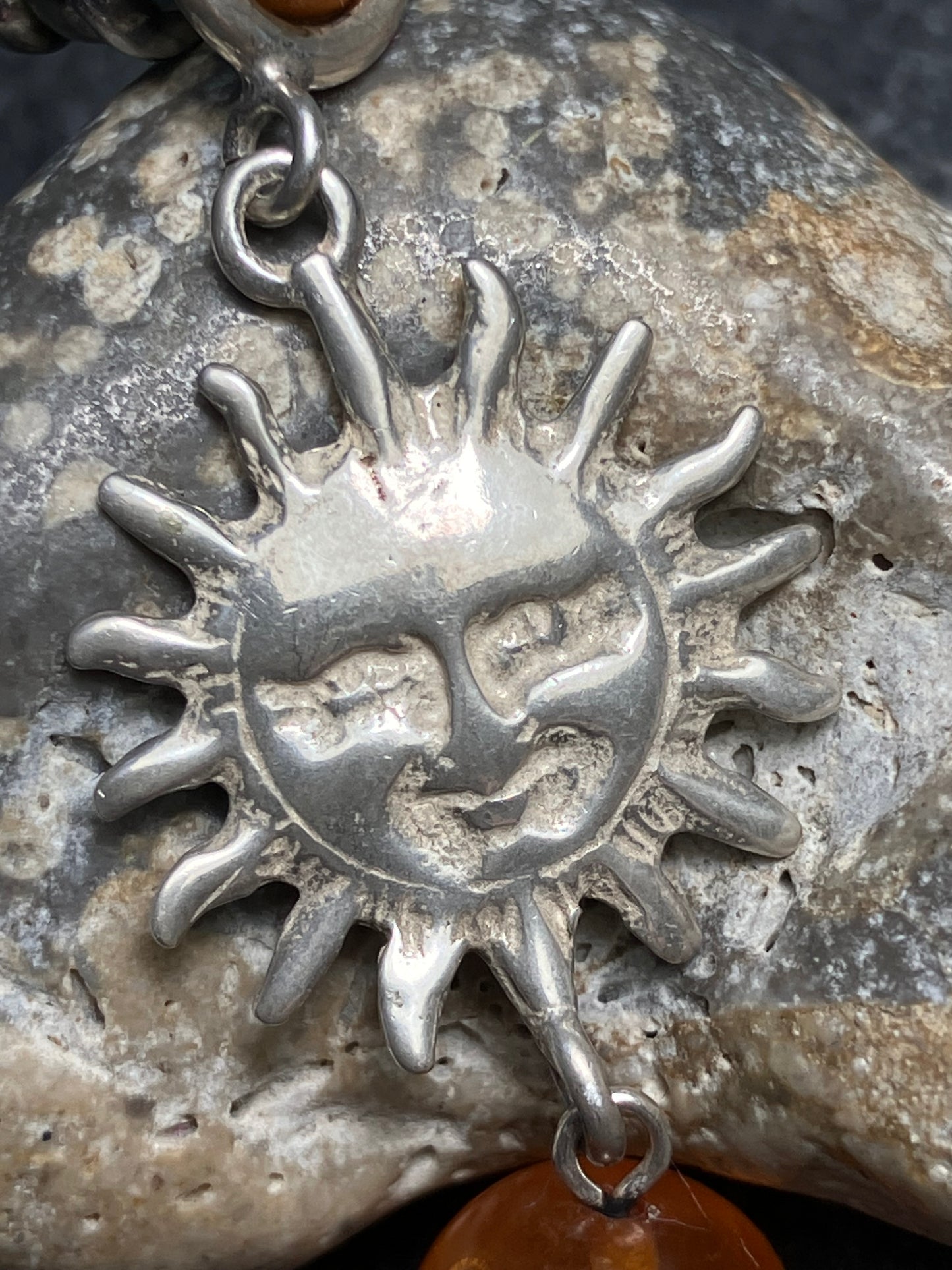 Absolutely fantastic vintage sterling silver sun and amber earrings.