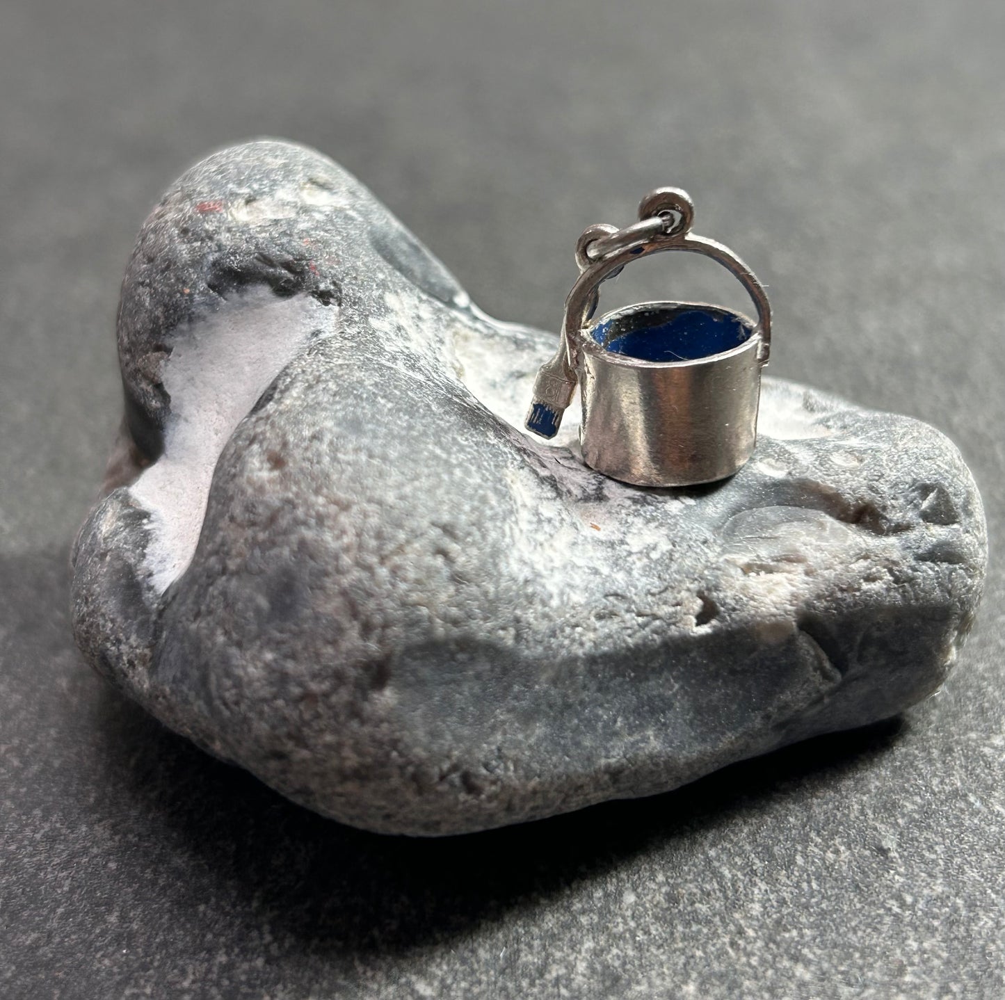 Pendant beautifully crafted in the shape of a painter’s paint pot and brush