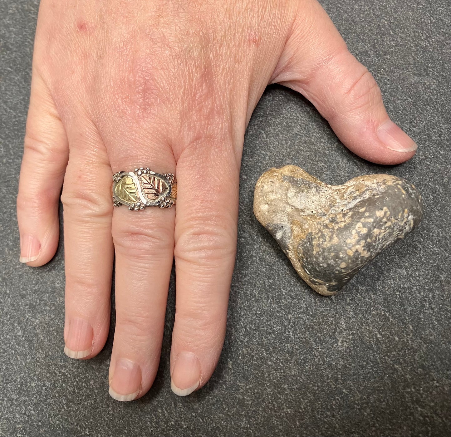 Wonderful vintage sterling silver and 12k gold and rose gold leaf ring. Made by Coleman &Co Black Hills.