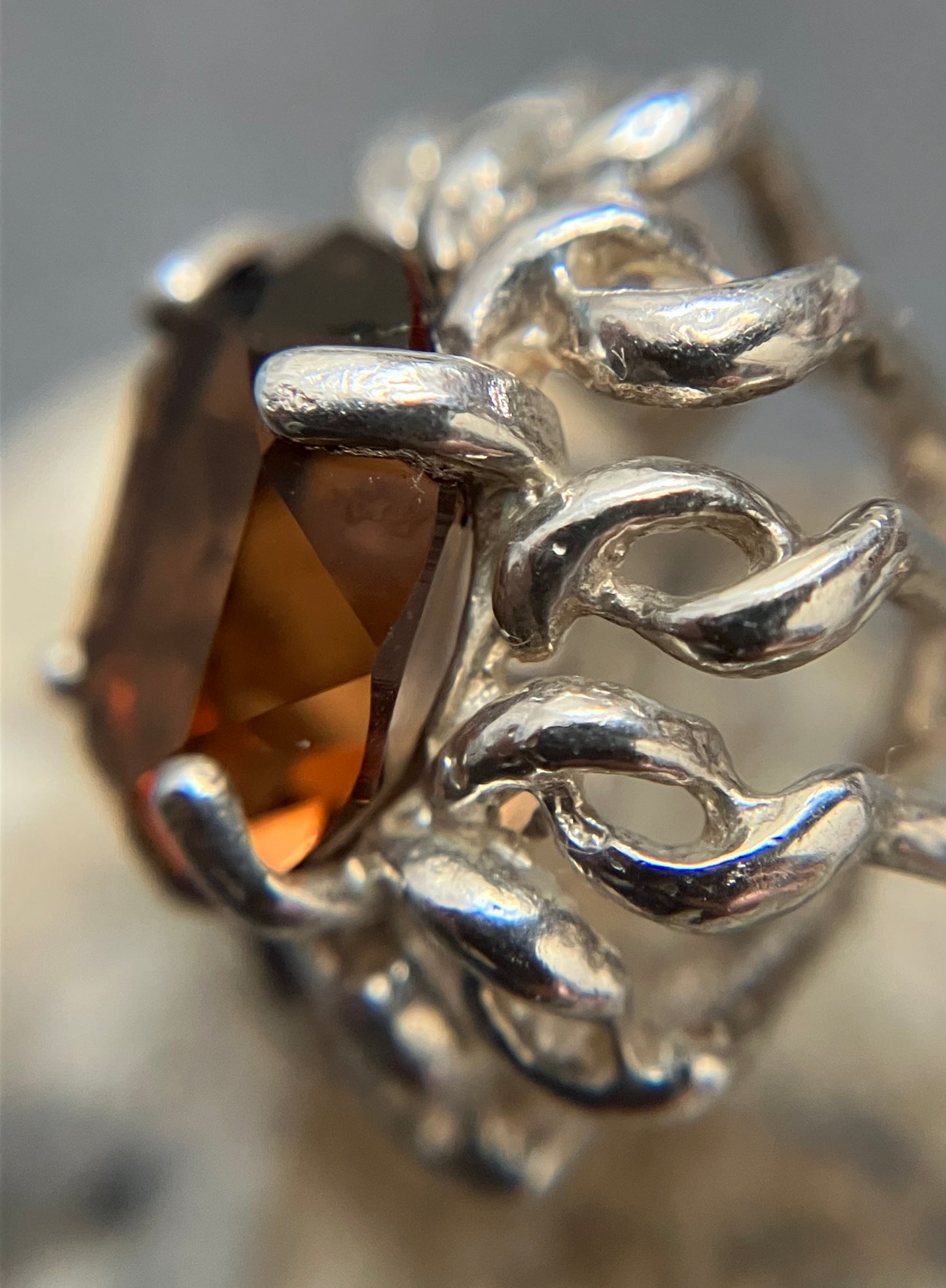 Vintage sterling silver ring set with a mandarin garnet cut stone