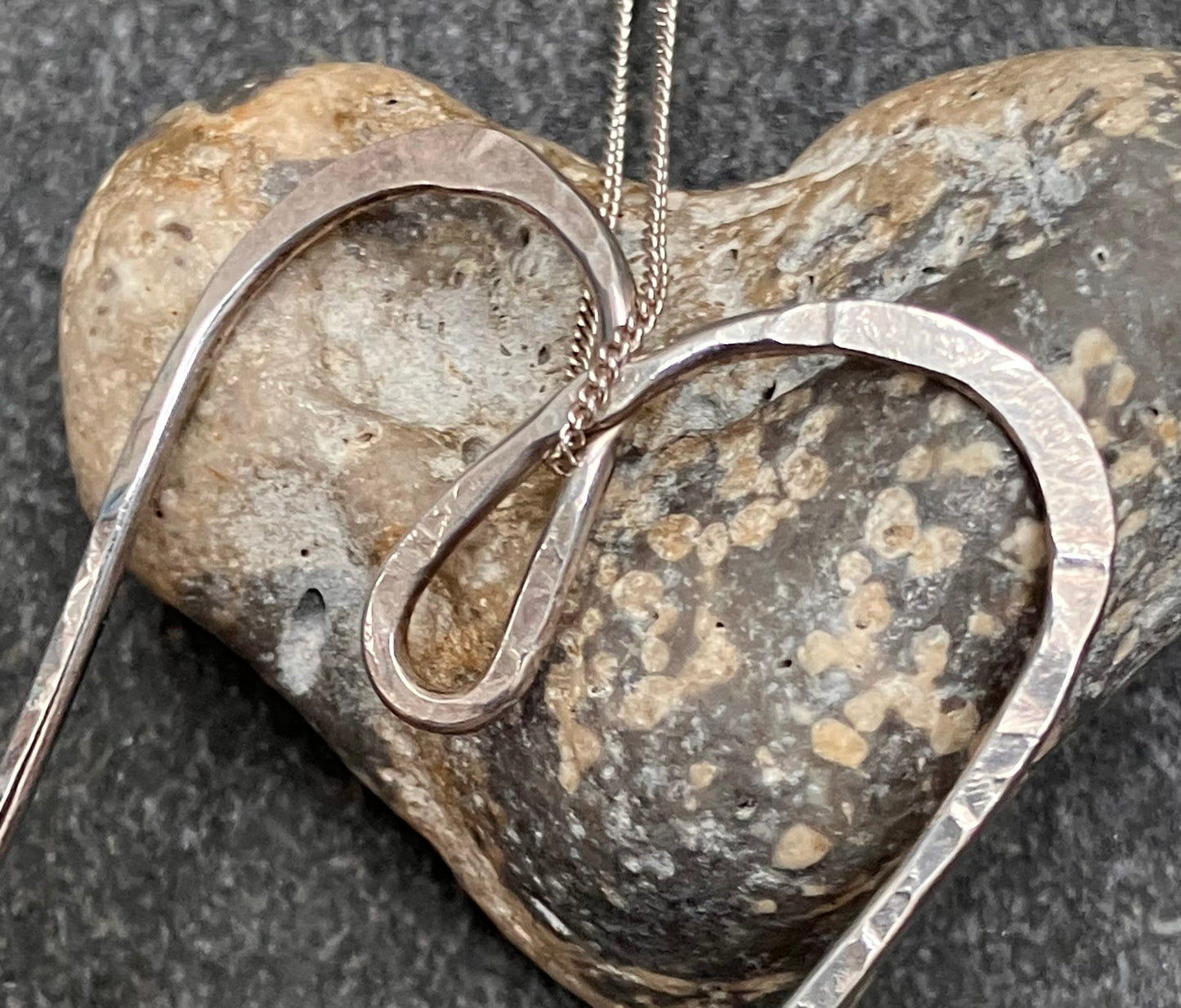 Sterling silver artisan heart and chain.