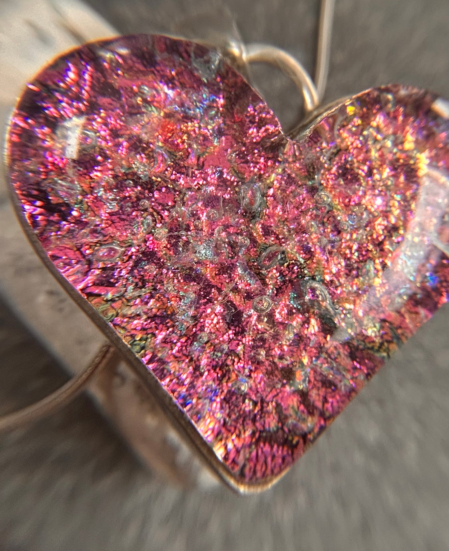 A beautiful vintage sterling silver and dichroic glass heart pendant