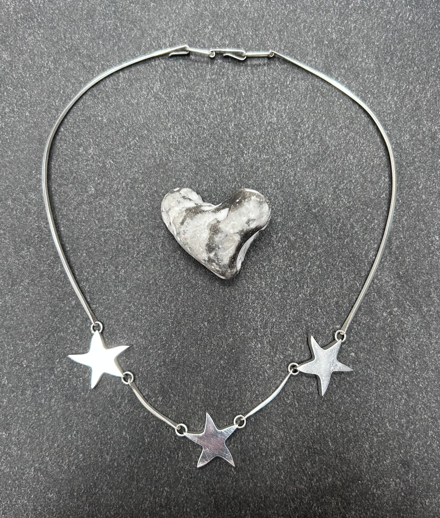 Wonderfully sculptural vintage sterling silver star necklace