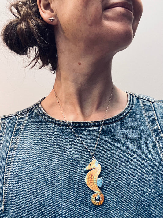 Vintage Sterling silver and enamel seahorse on original chain. Made by Ari D Norman