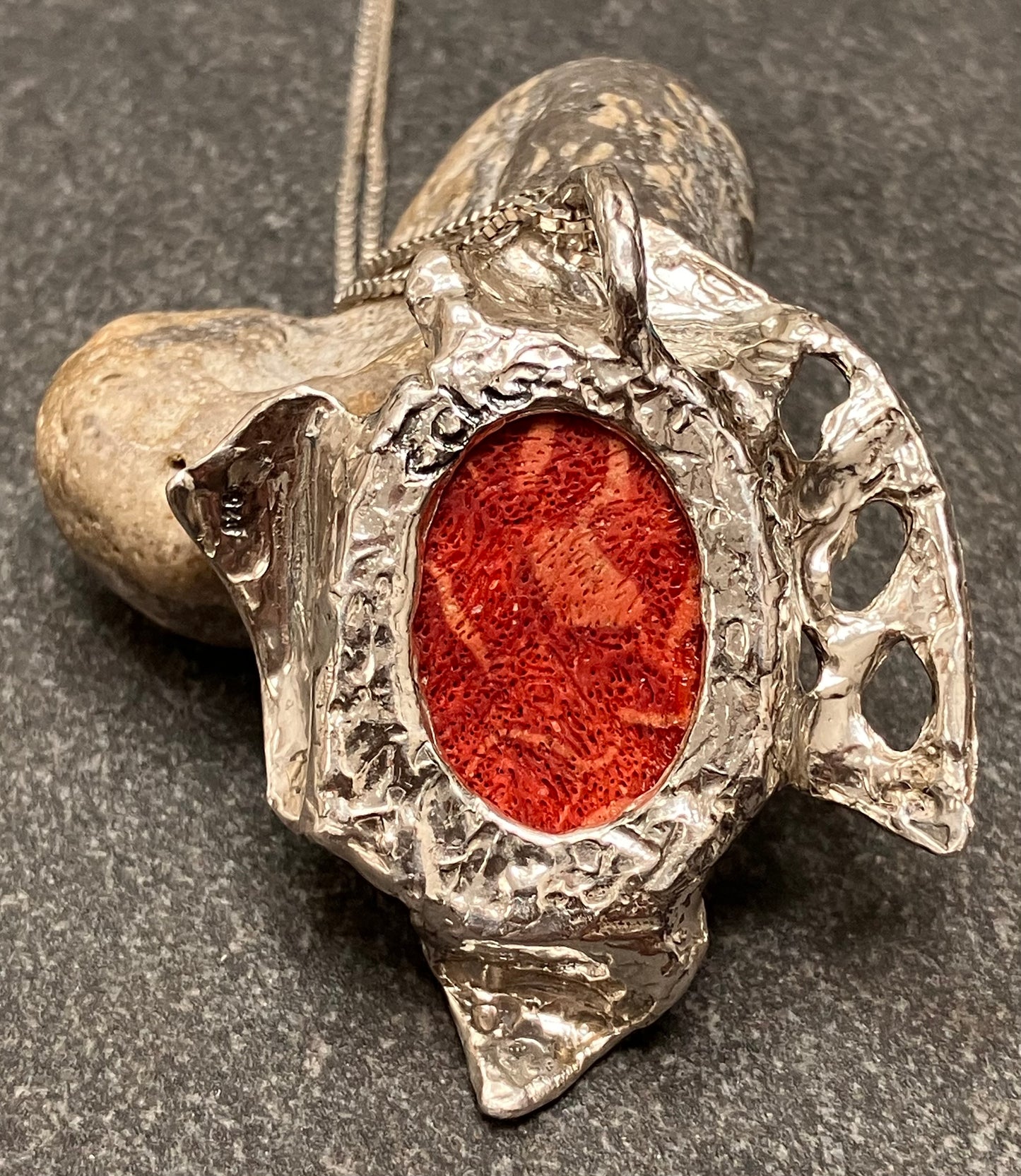 Statement vintage sterling silver and sponge coral artisan pendant with original vintage chain.