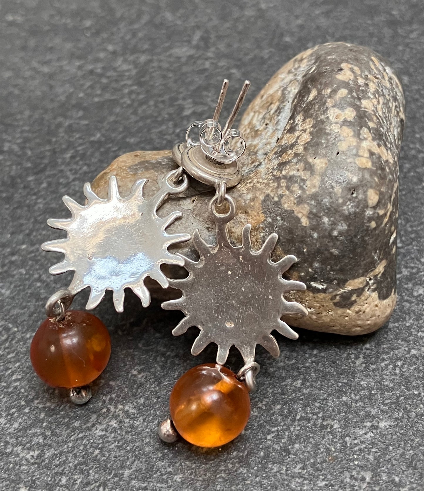 Absolutely fantastic vintage sterling silver sun and amber earrings.