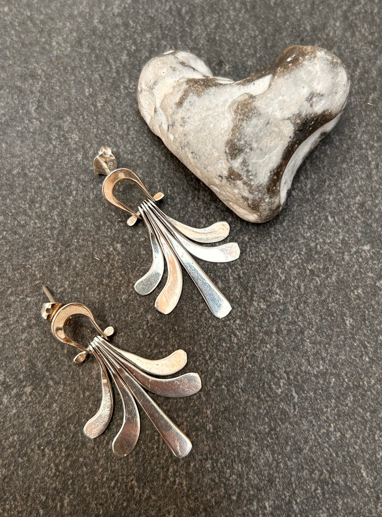 A striking pair of vintage sterling silver Mexican earrings