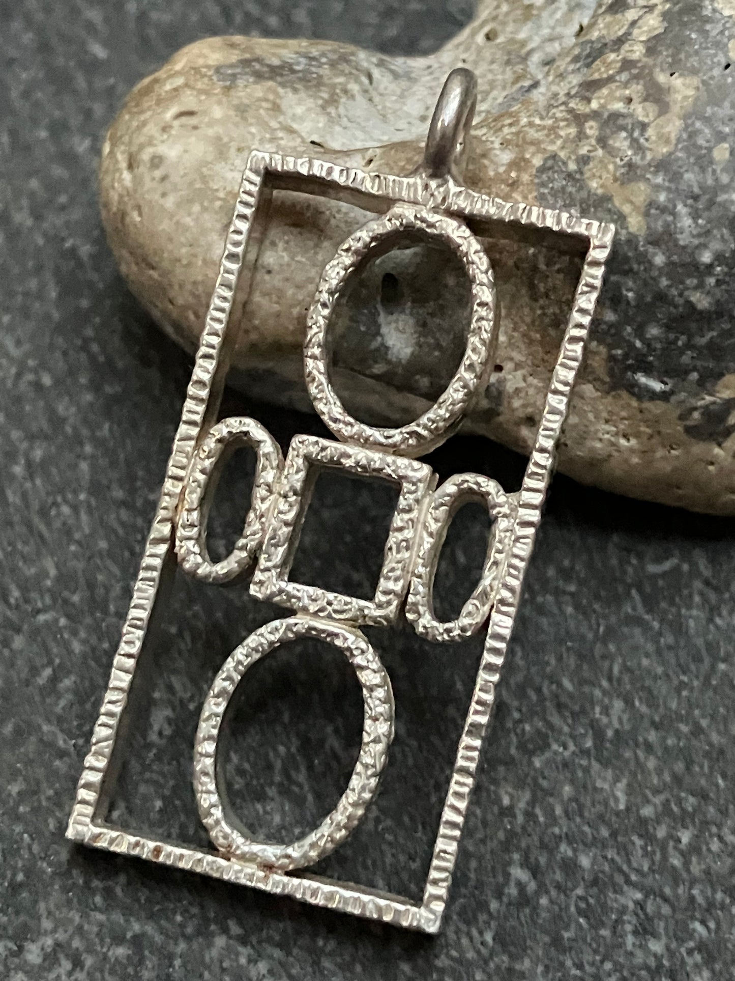 Super example of a vintage Brutalist/Modernist sterling silver pendant by Toye, Kenning & Spencer.