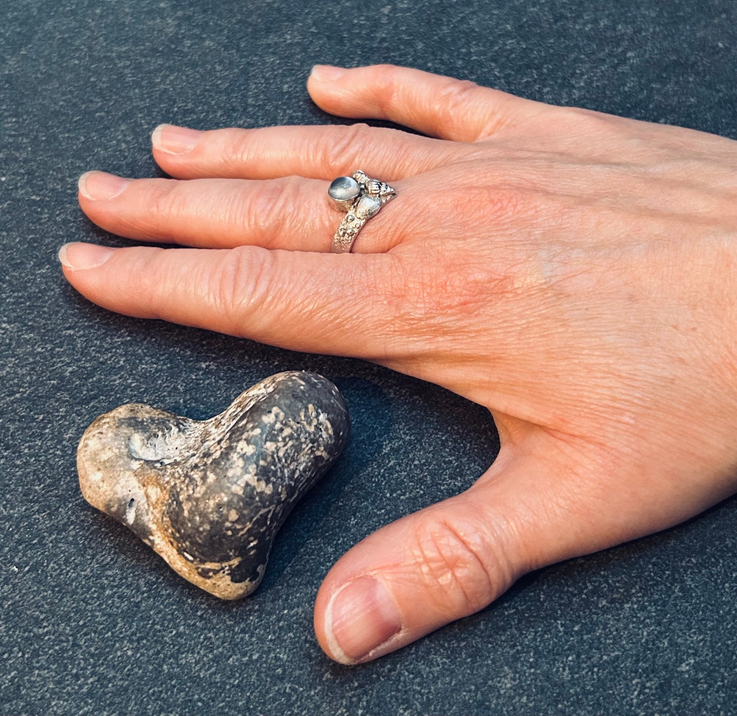 Vintage sterling silver moonstone and shell artisan ring.