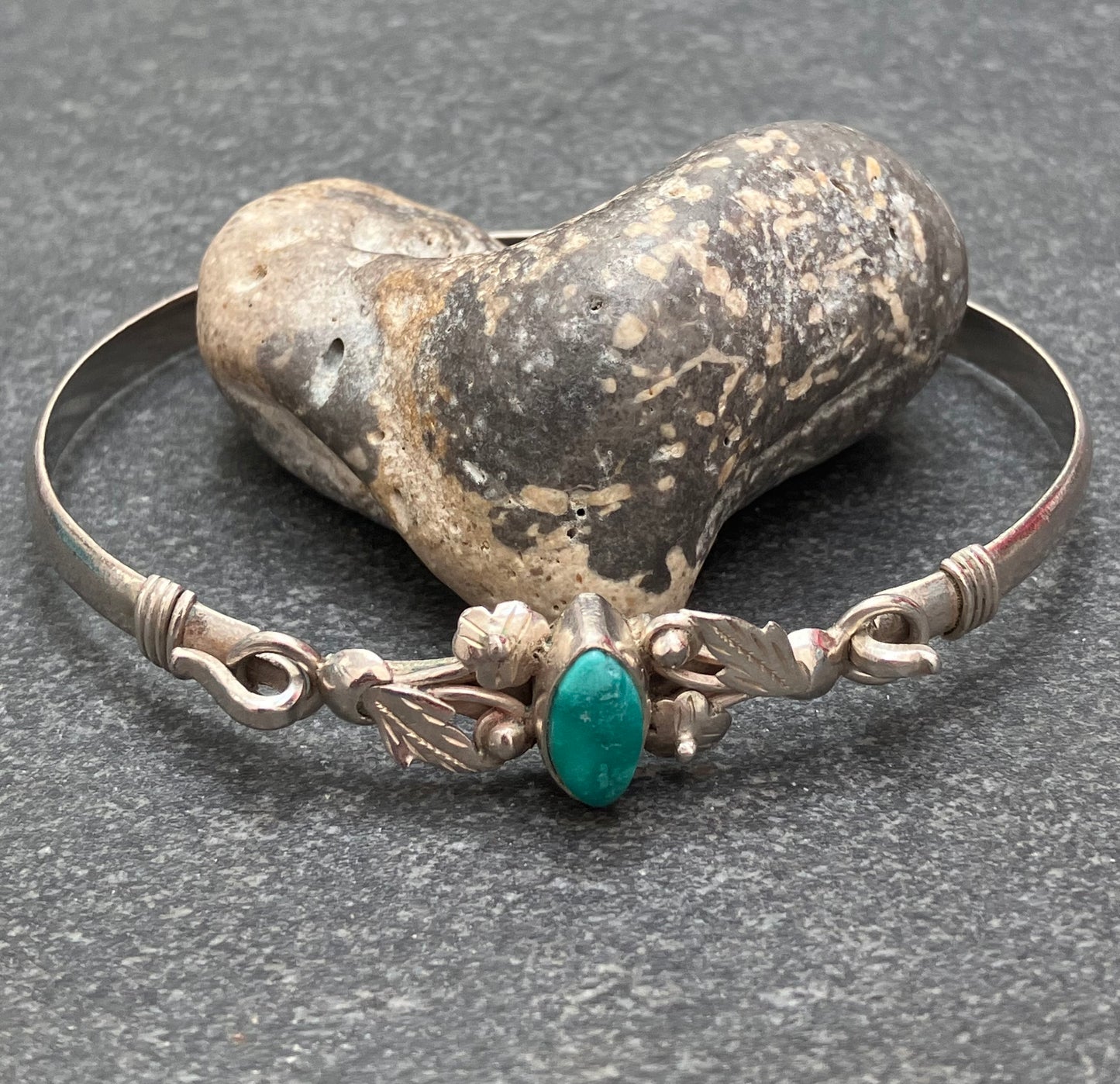 Vintage sterling silver bangle with a fuchsite stone centre.