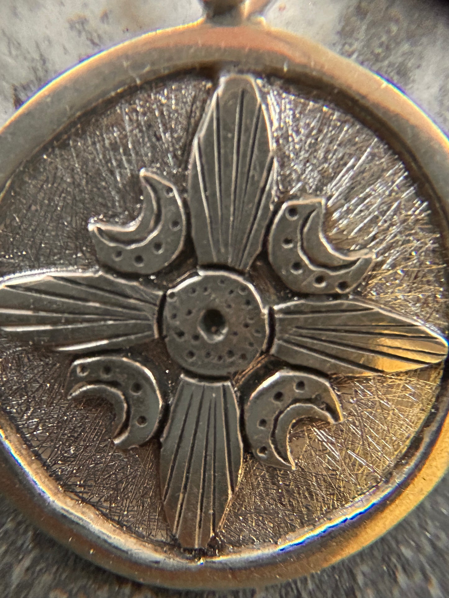 A striking vintage sterling silver circular pendant
