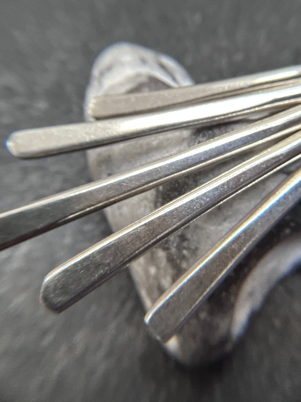 Mexican sterling silver earrings featuring slender bars.
